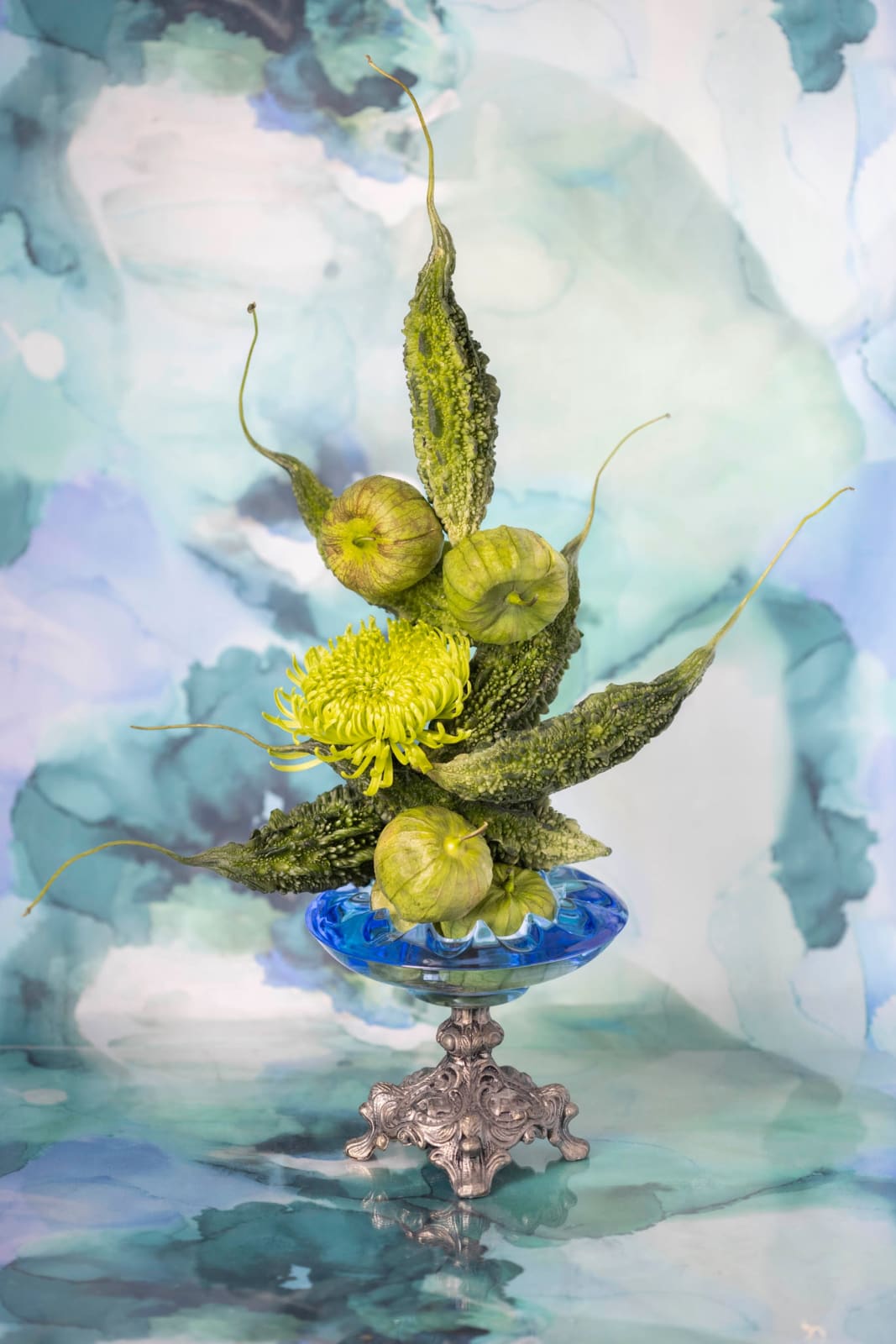 green veggies stacked high in glass bowl