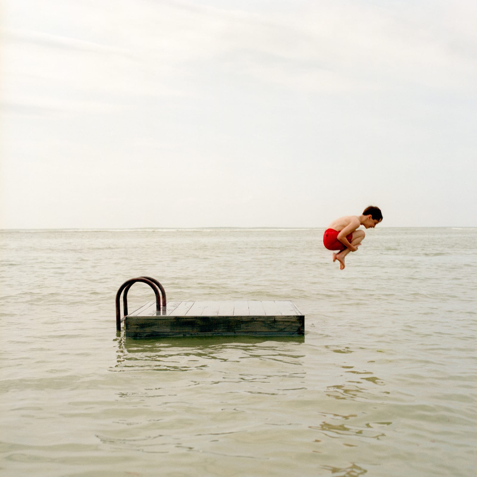 Rodney Smith photograph boy jumping off dock