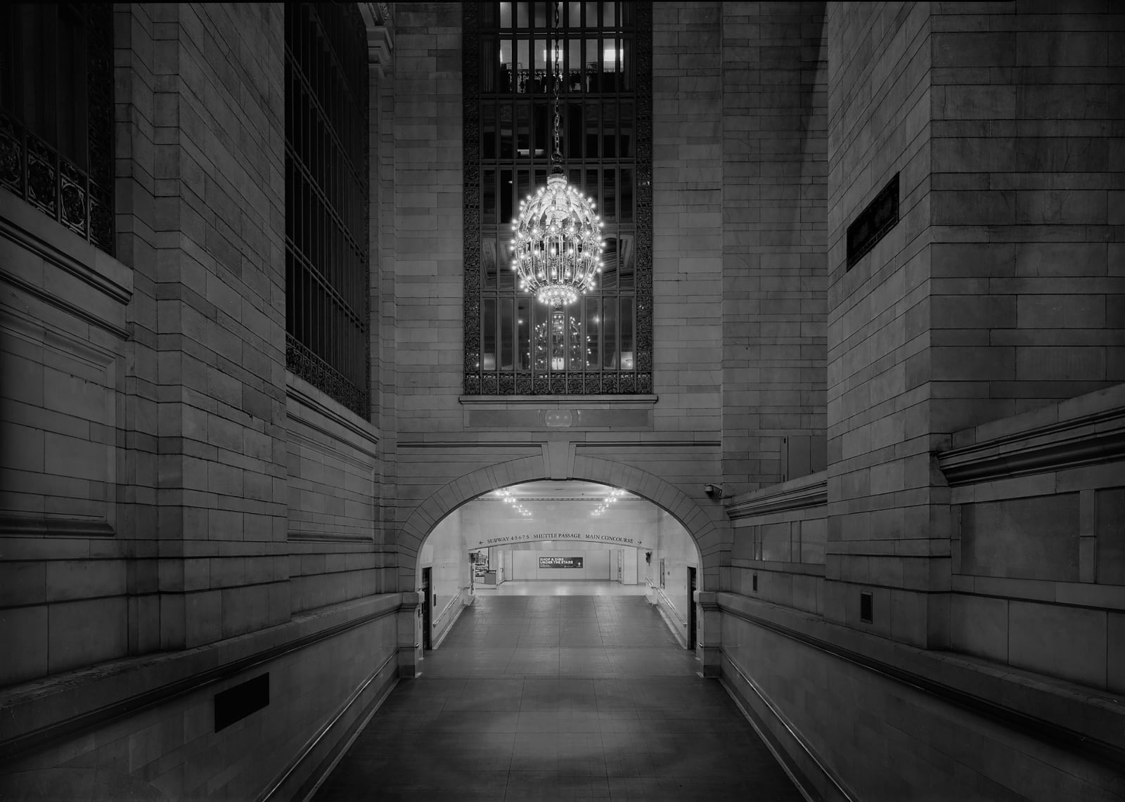 photograph of empty area grand central station with chandelier by Michael massaia