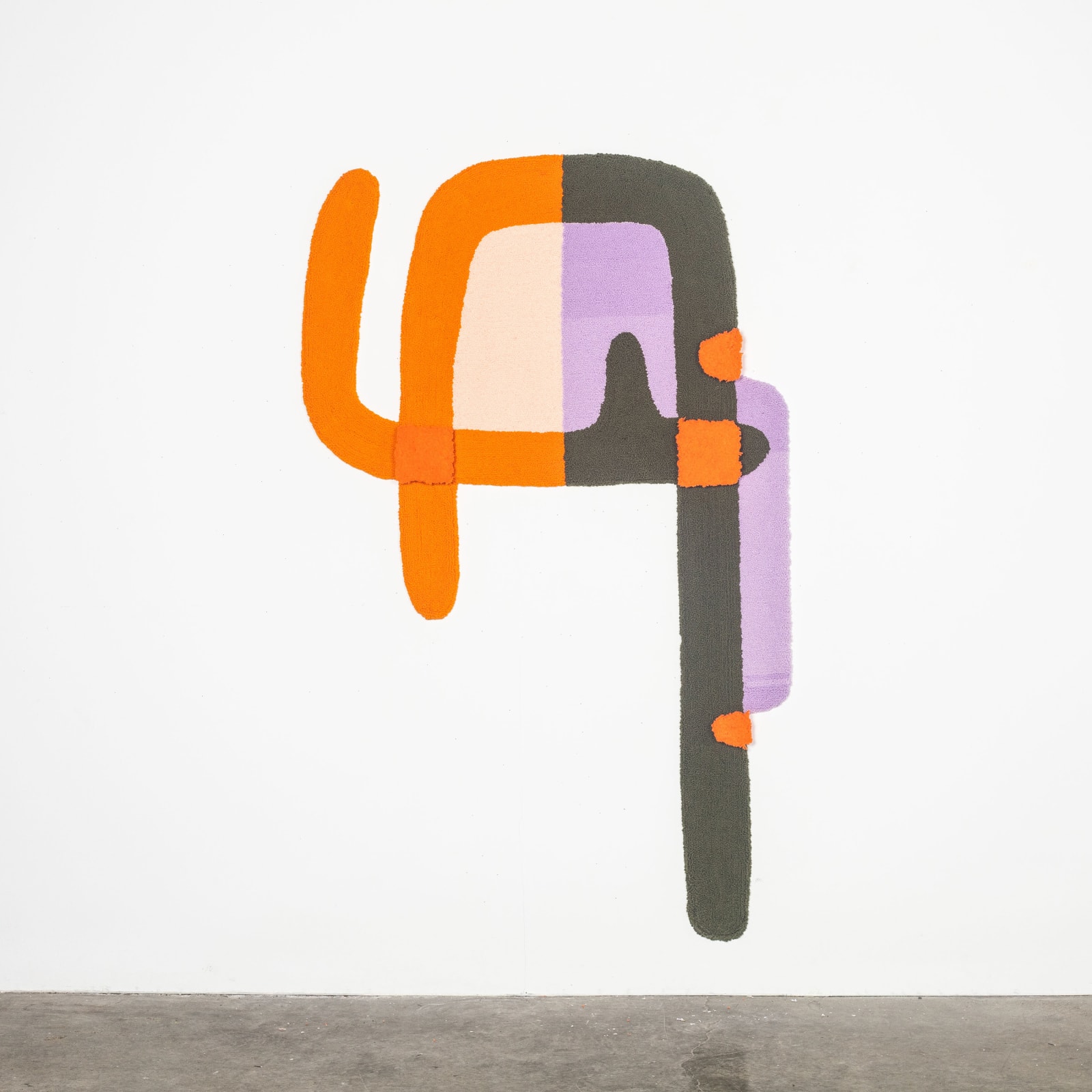 Orange, Green, Purple rug shaped like an elephant