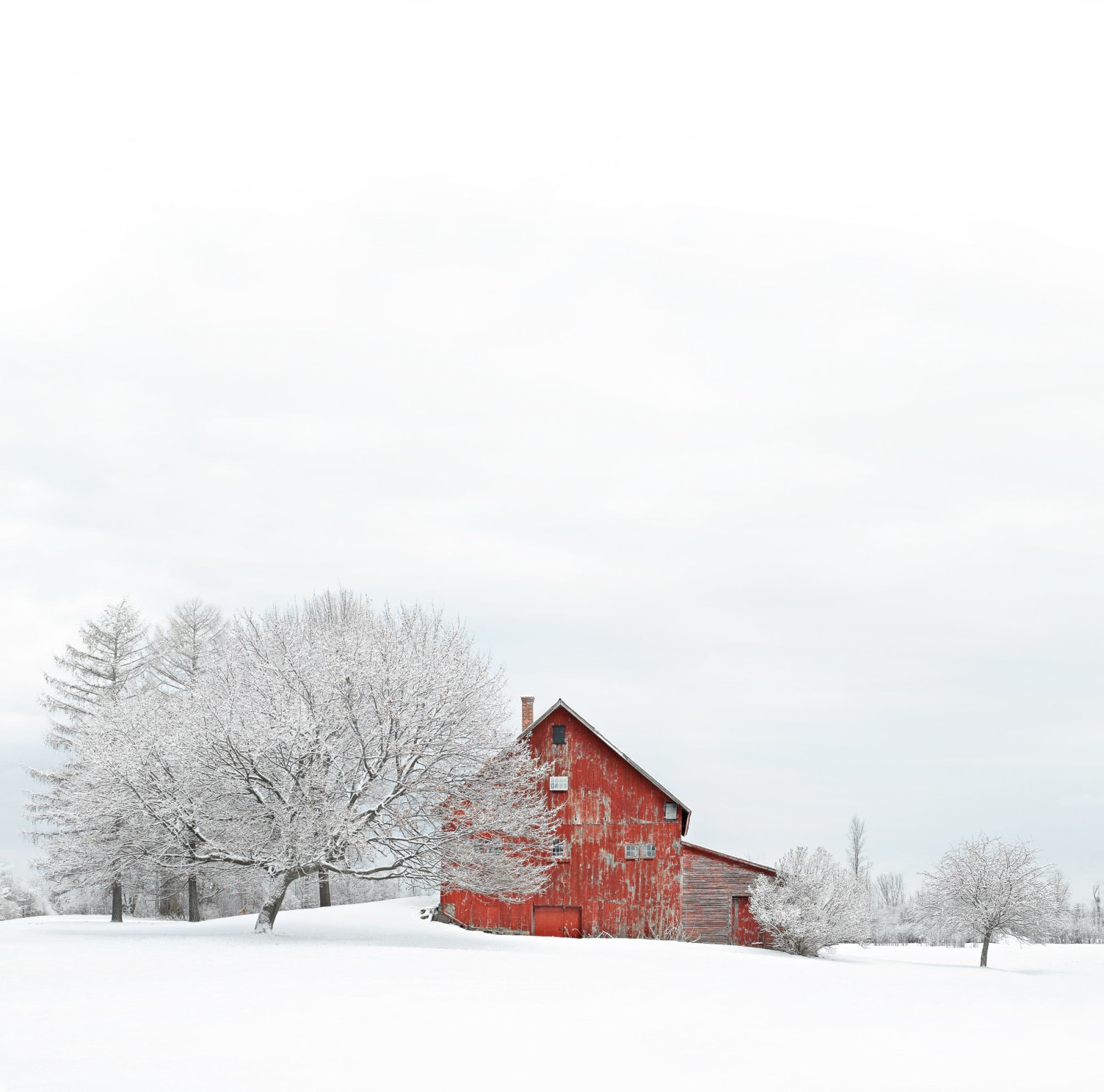 Jim Westphalen photograph of red barn in winter snow purchase at Gilman Contemporary
