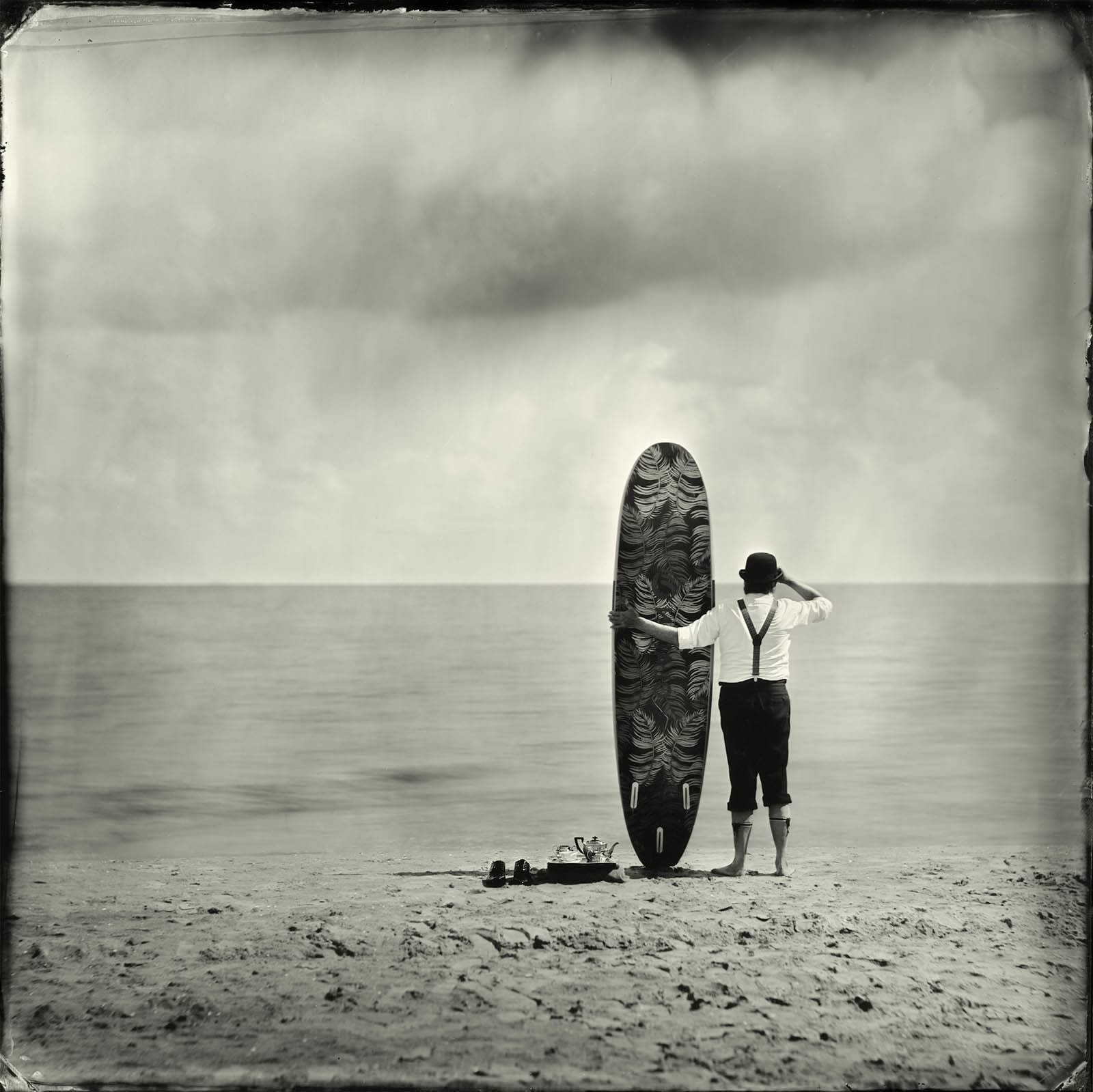 Alex Timmermans photography man with surfboard buy here Gilman Contemporary Sun valley art gallery