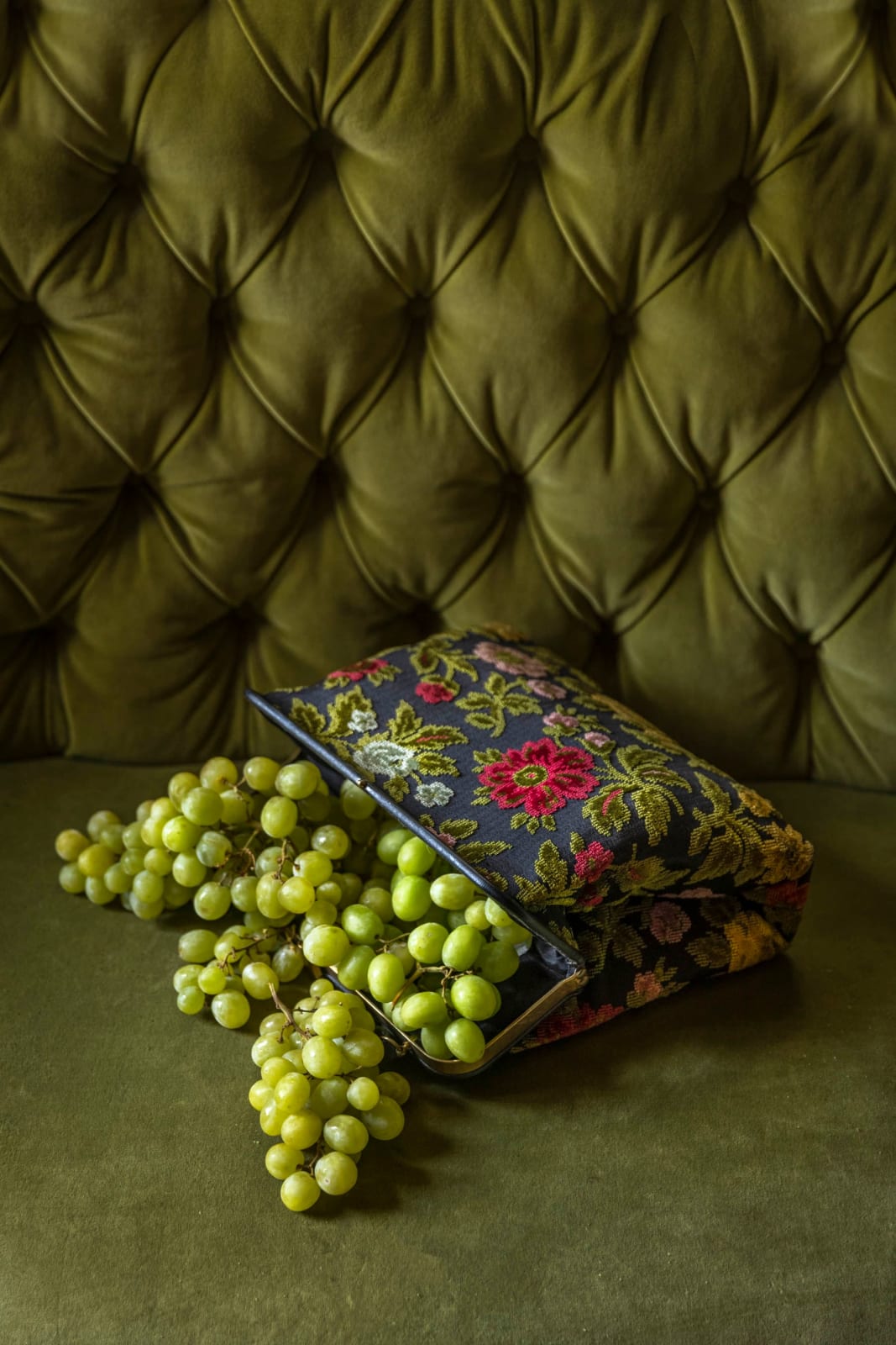 jp terlizzi picture of grapes spilling out of vintage purse
