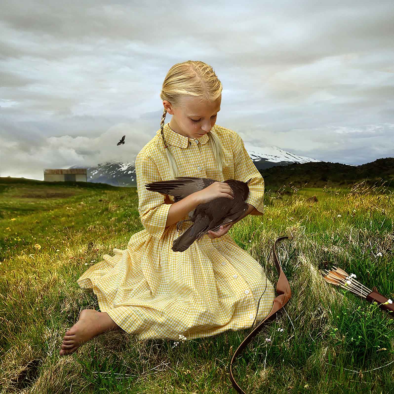 Iceland photograph Tom Chambers young girl with bird in meadow buy here Sun Valley contemporary art Gilman gallery