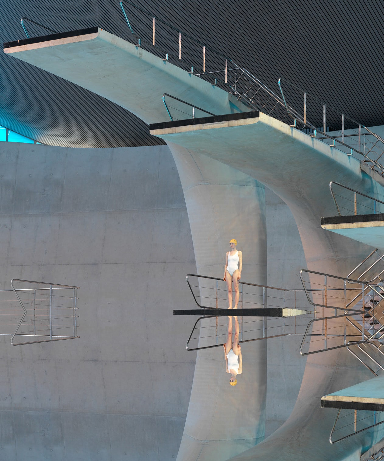 Maria Svarbova photograph swimmer in white swimsuit yellow cap high dive grey background Gilman Contemporary