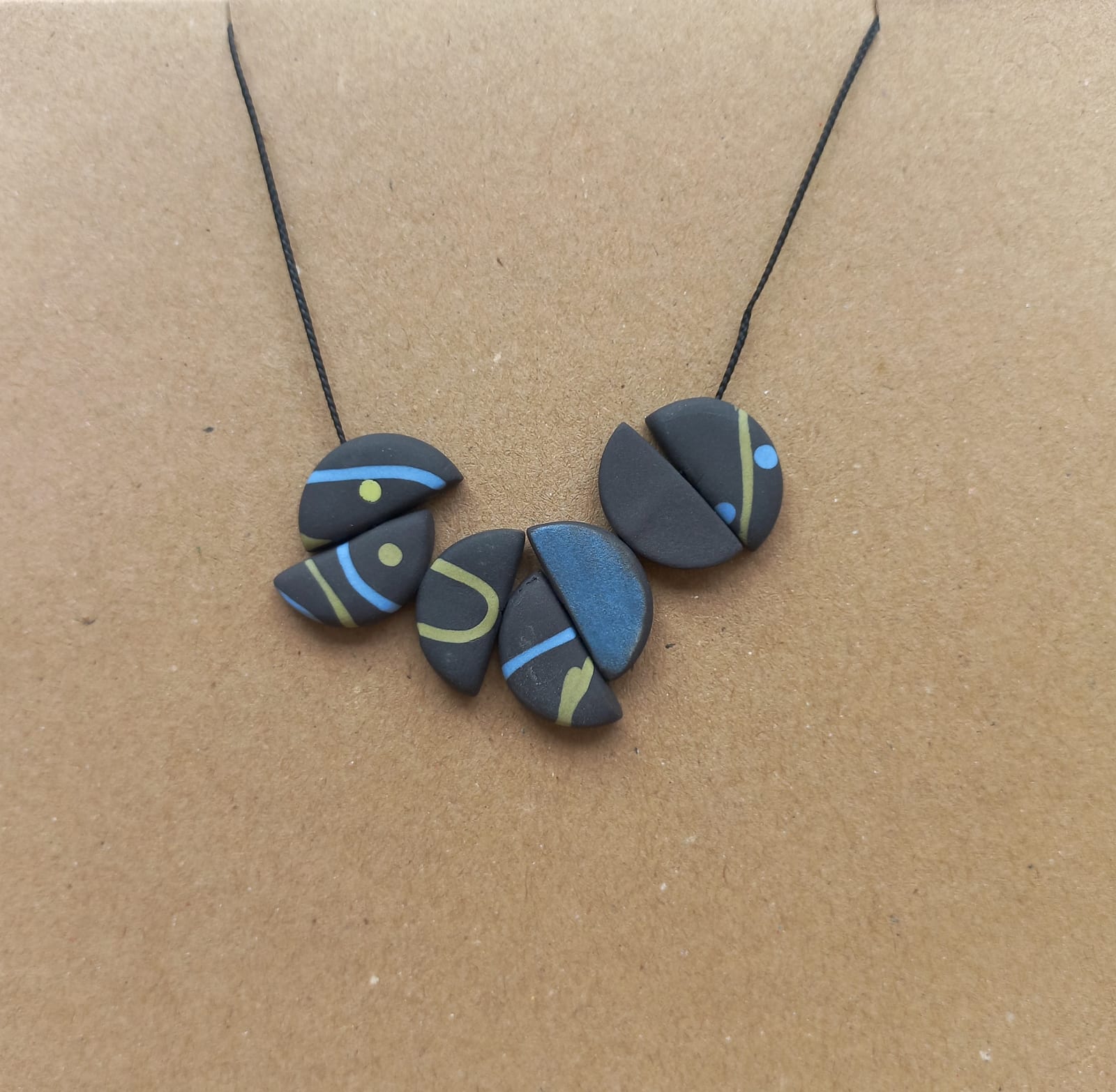 Carol Sinclair, Semi Circle Necklace II