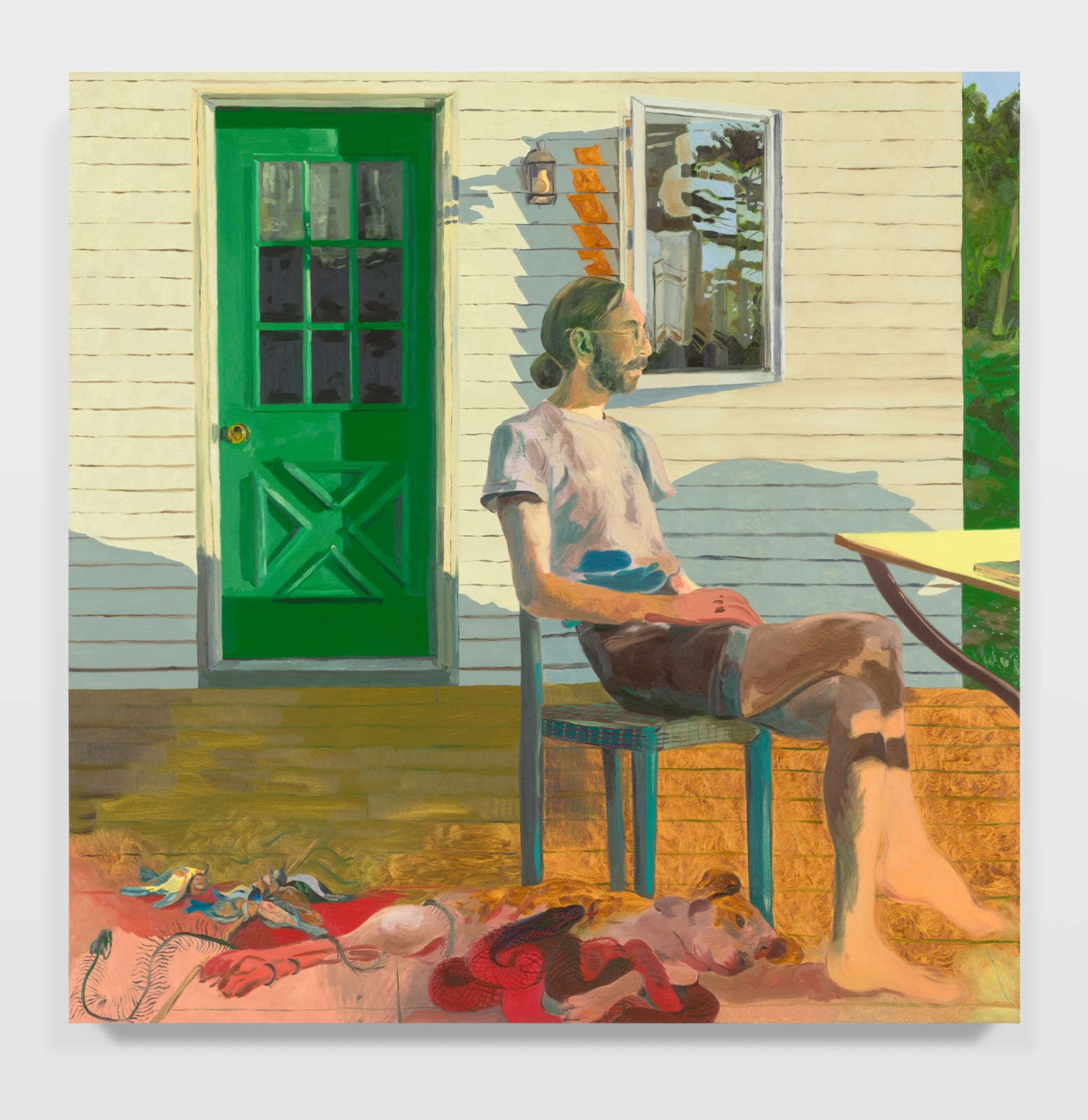 abstract painting of a man sitting in a chair in front of a house that has a green door. the man's gair is pulled back and the bottom of the painting, where a dog is laying down, disintegrates into a carnal pink and red