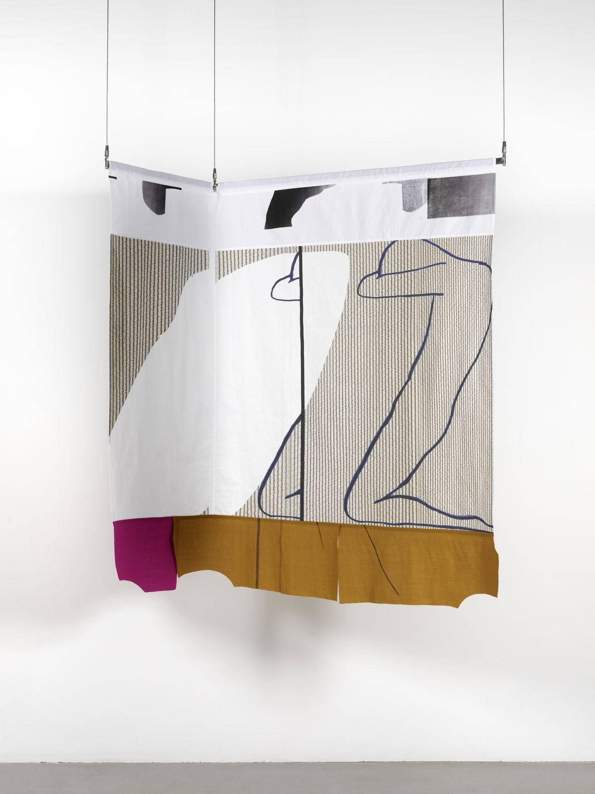 A medium sized textile hanging from the ceiling against a white wall, with an outline of a figure on the right side of the fabric.