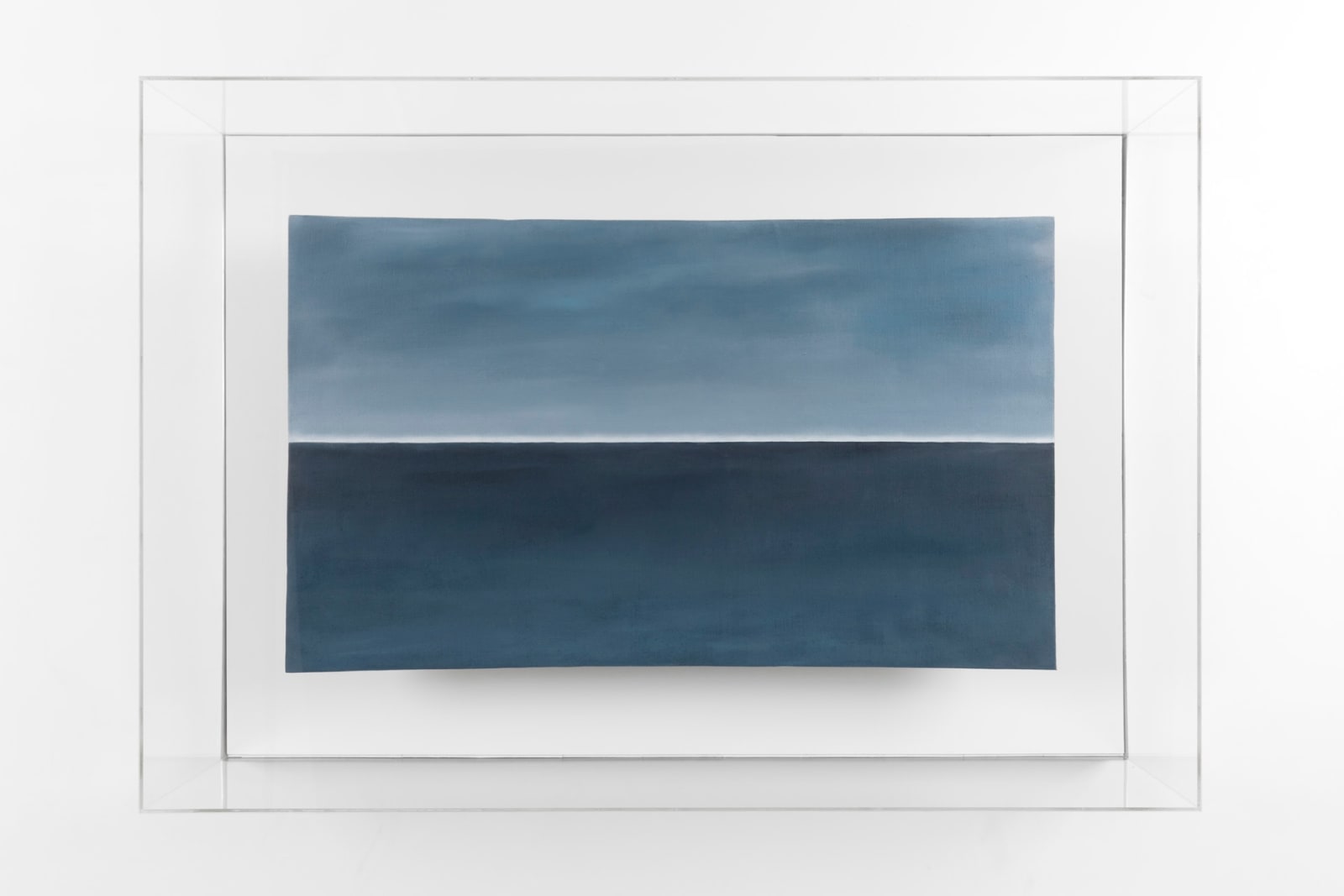 A mixed media piece depicting two shades of blue.