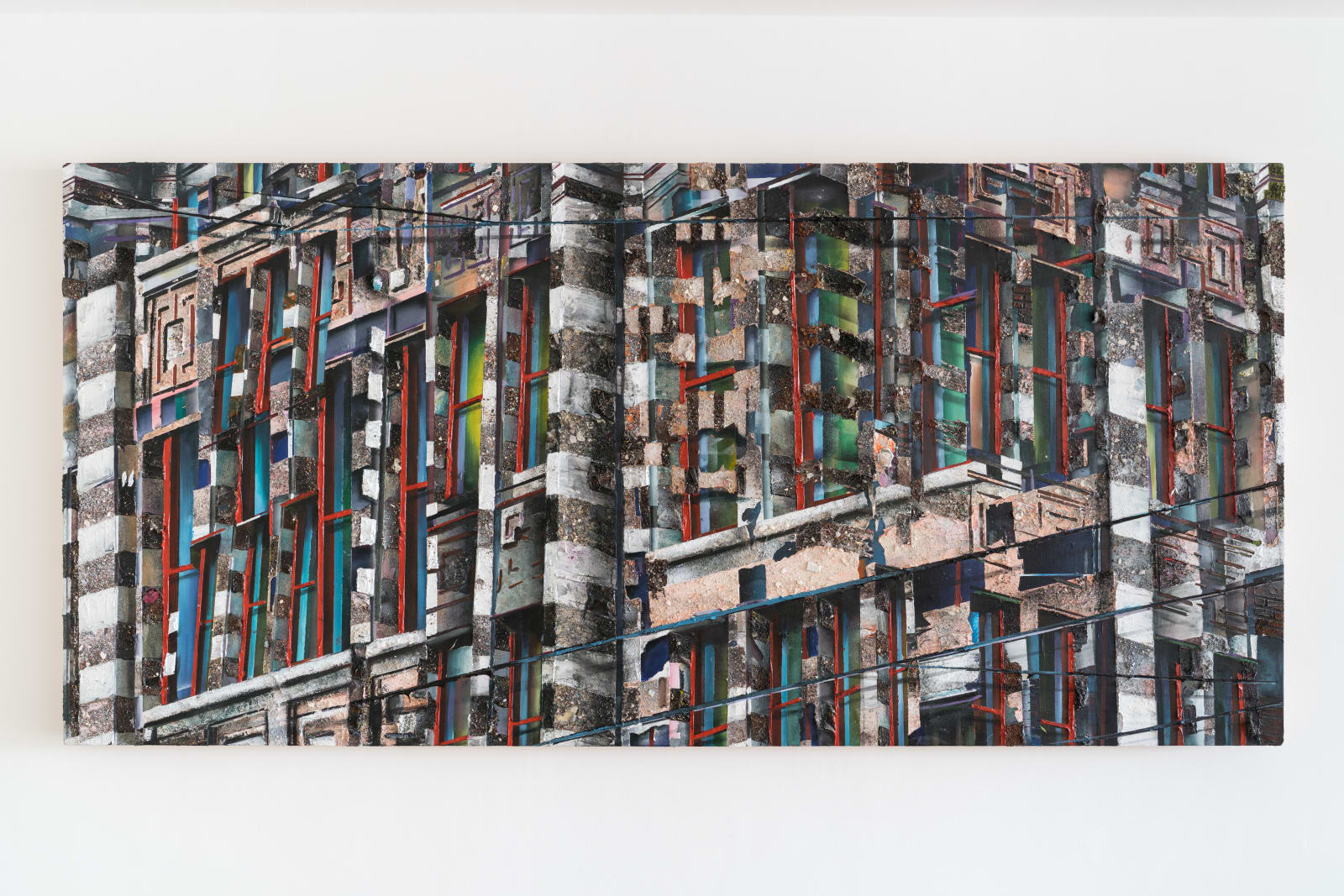 A mixed media image of a multicolored, abstract building.