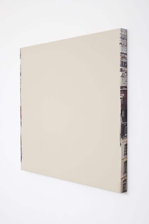 Off white acrylic paint on a canvas.