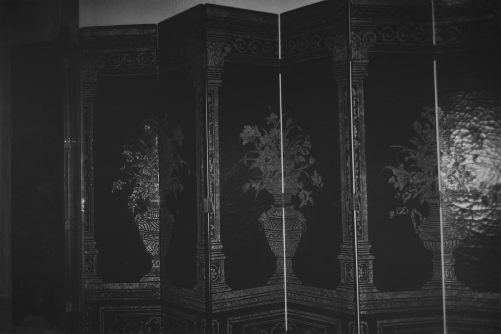 A black and white inkjet print of a Chinese partition.