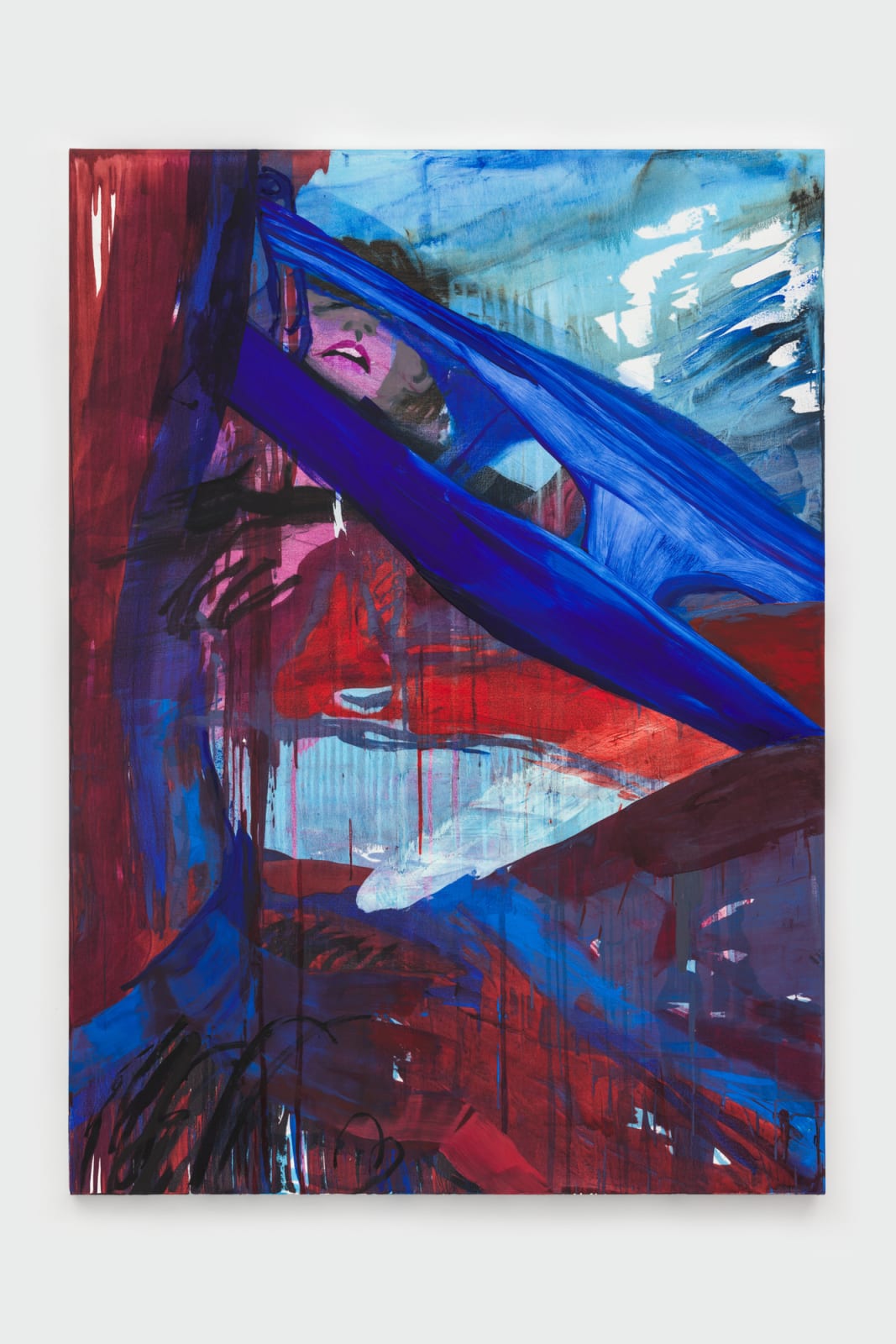 A tall canvas composed of swooping motion and contrasting diagonals. A streak of crimson down the left side and across the bottom frame an inset brighter zone, filled with lines, imagery and washy poolwater blue. This dreamy zone is cut with a large sharp shape, painted economically with shadows that make it pop into vivid three dimensions. The shape could be the top of a hammer, the turned leg of a wooden chair or the familiar stretched fabric of pulled-down panties observed from above. Through a hole in the shape, a small cartoonish face calls out, one closed eye, little nostrils and an open mouth with distinctly pink, parted lips. Whatever noise she's emitting travels through the painting, reverberating in hidden body parts - a hand gripping crotch, foot curling backwards. All the while a wall of drips giving the images a sense of sliding downwards as it rises up.