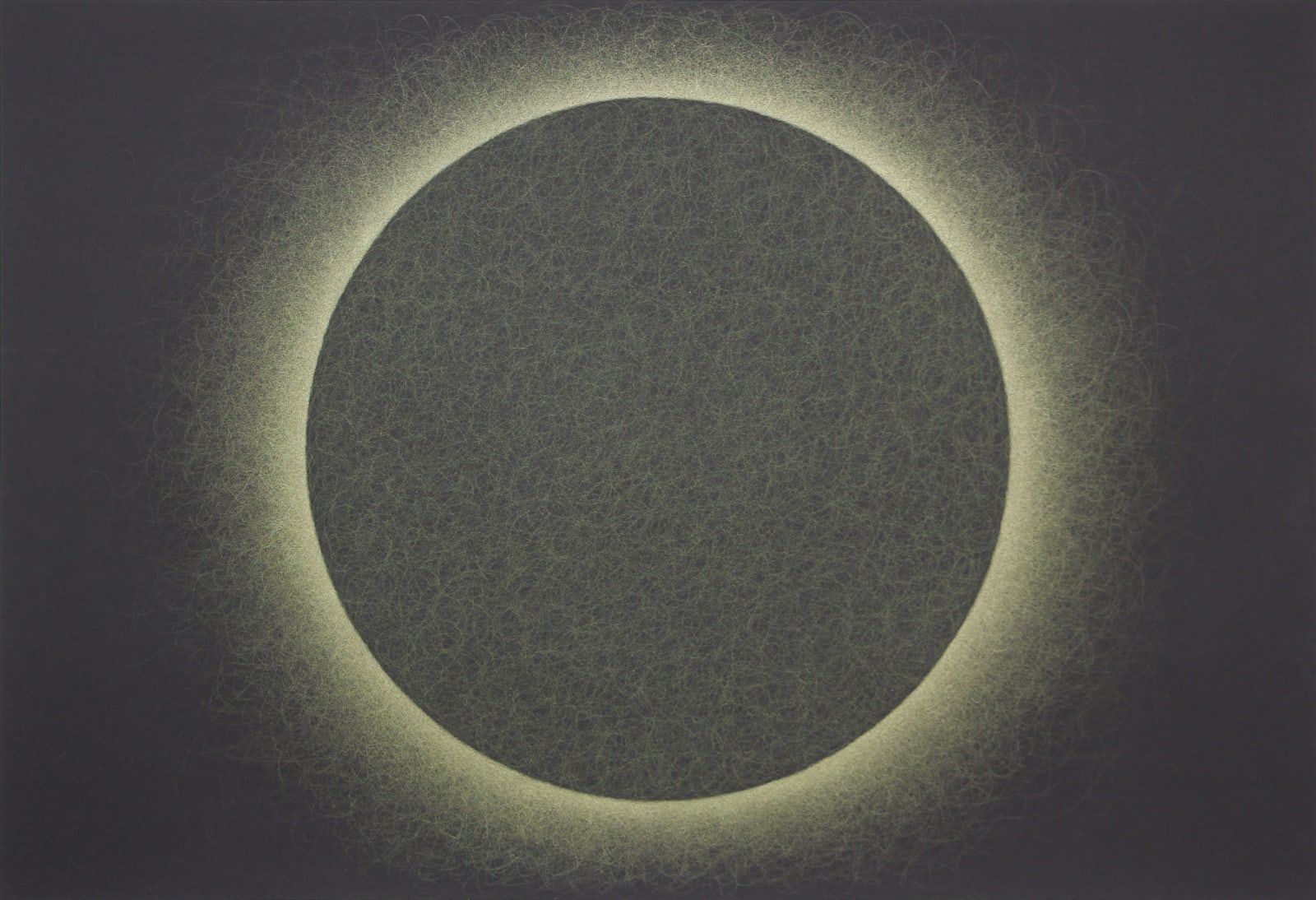A greenish sphere is backlit by a neon yellow halo on a black horizontal rectangular background.