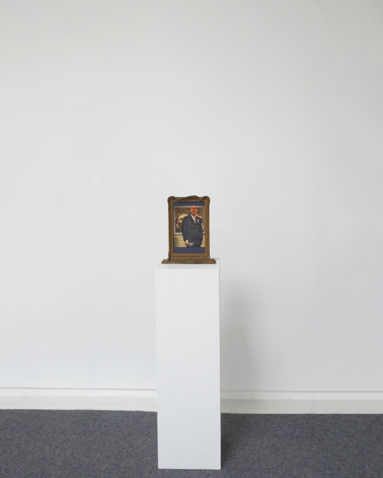 Untitled (Suited Man Holding Key), installed