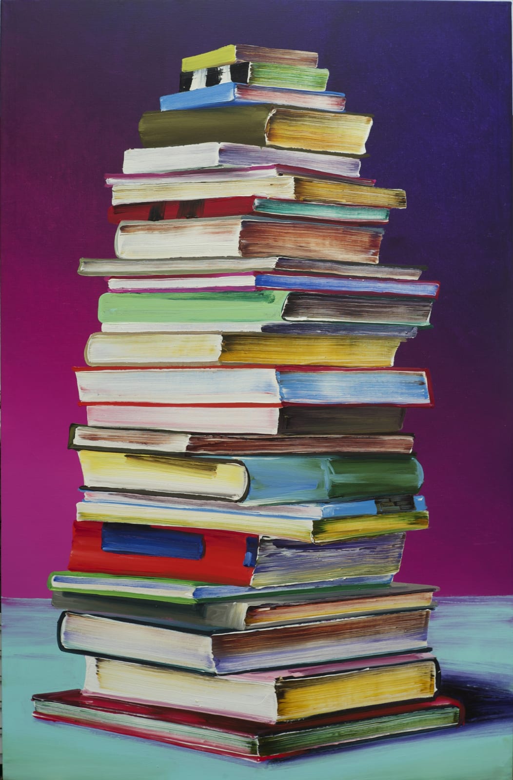 Stack of colorful books, each one getting smaller as the tower grows higher.