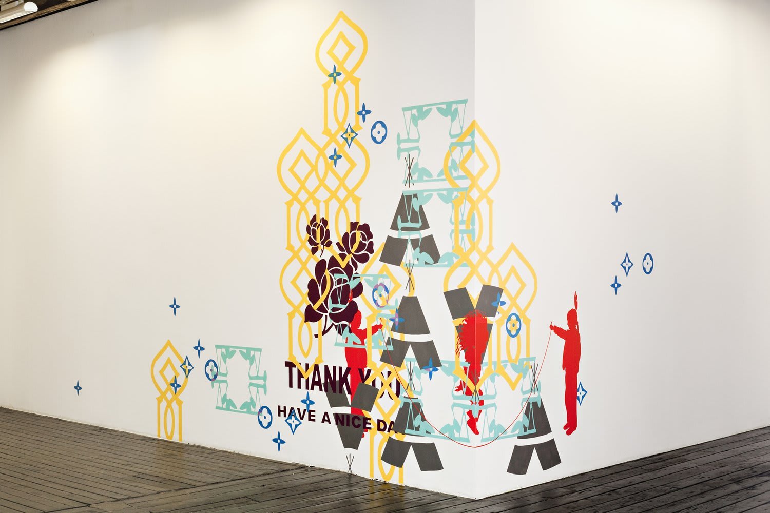 Several layers of multi-colored acrylic paint overlap to display several patterns on the corner of two white walls The symbols depict various asian and indigenous stereotypes, luxury brand icons, and elements from the artist’s own Asian American upbringing in the primarily white suburb of Orange County California