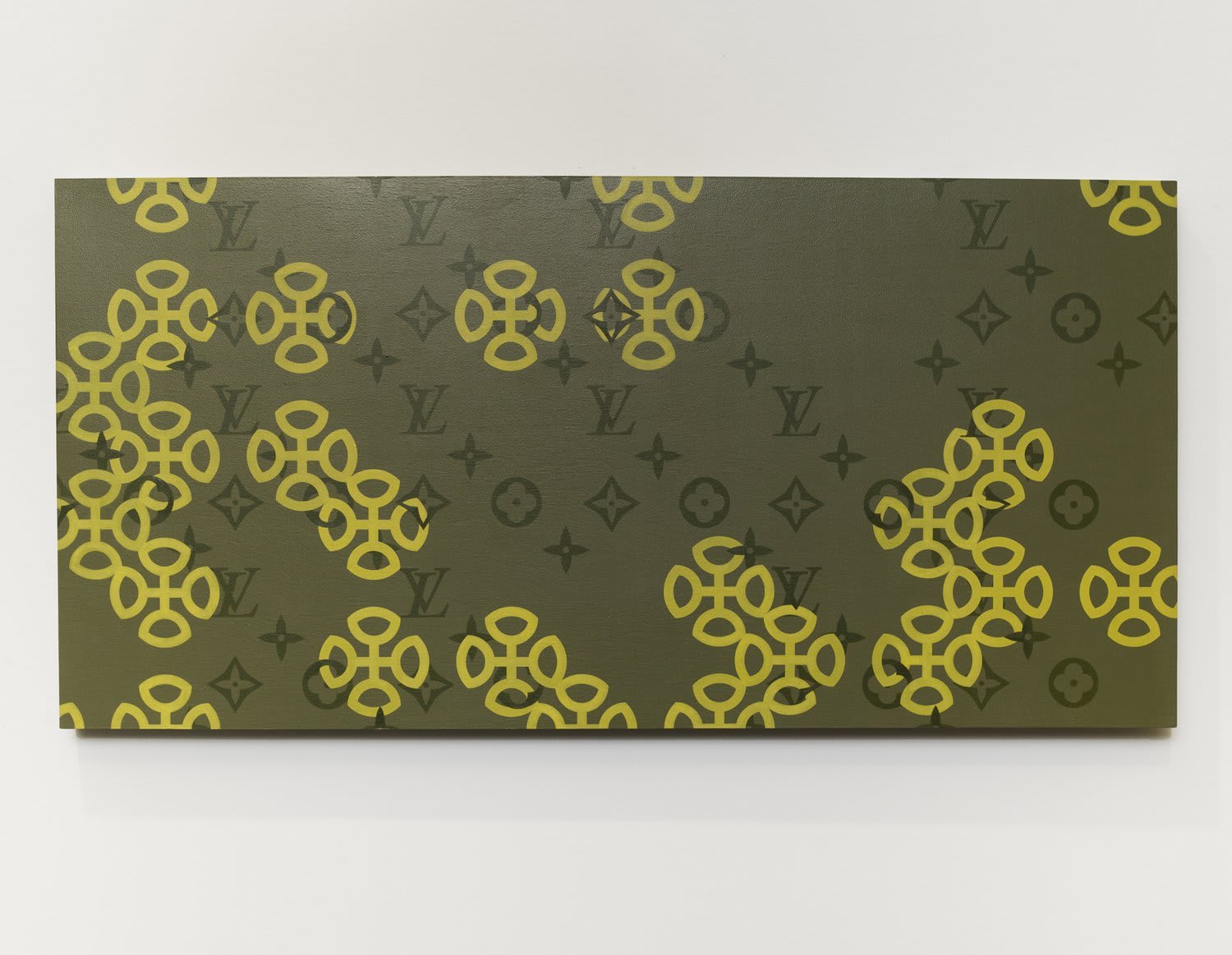 Several green and yellow overlapping patterns on a wooden panel depict luxury brands and asian iconography