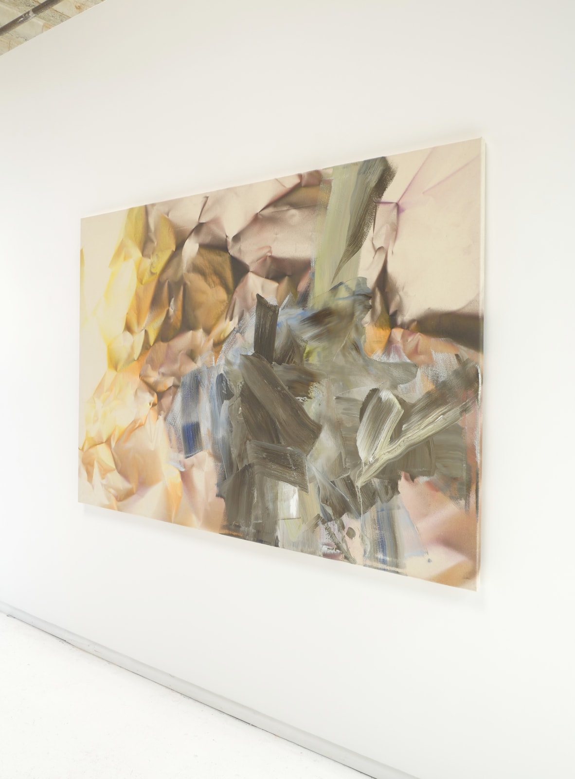 Side view of hanging painting.