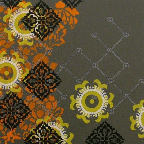 Several layers of multi-colored acrylic paint overlap to display multiple patterns against a dark gray painted panel The symbols depict vegetal and central asian suzani motifs with luxury brand icons