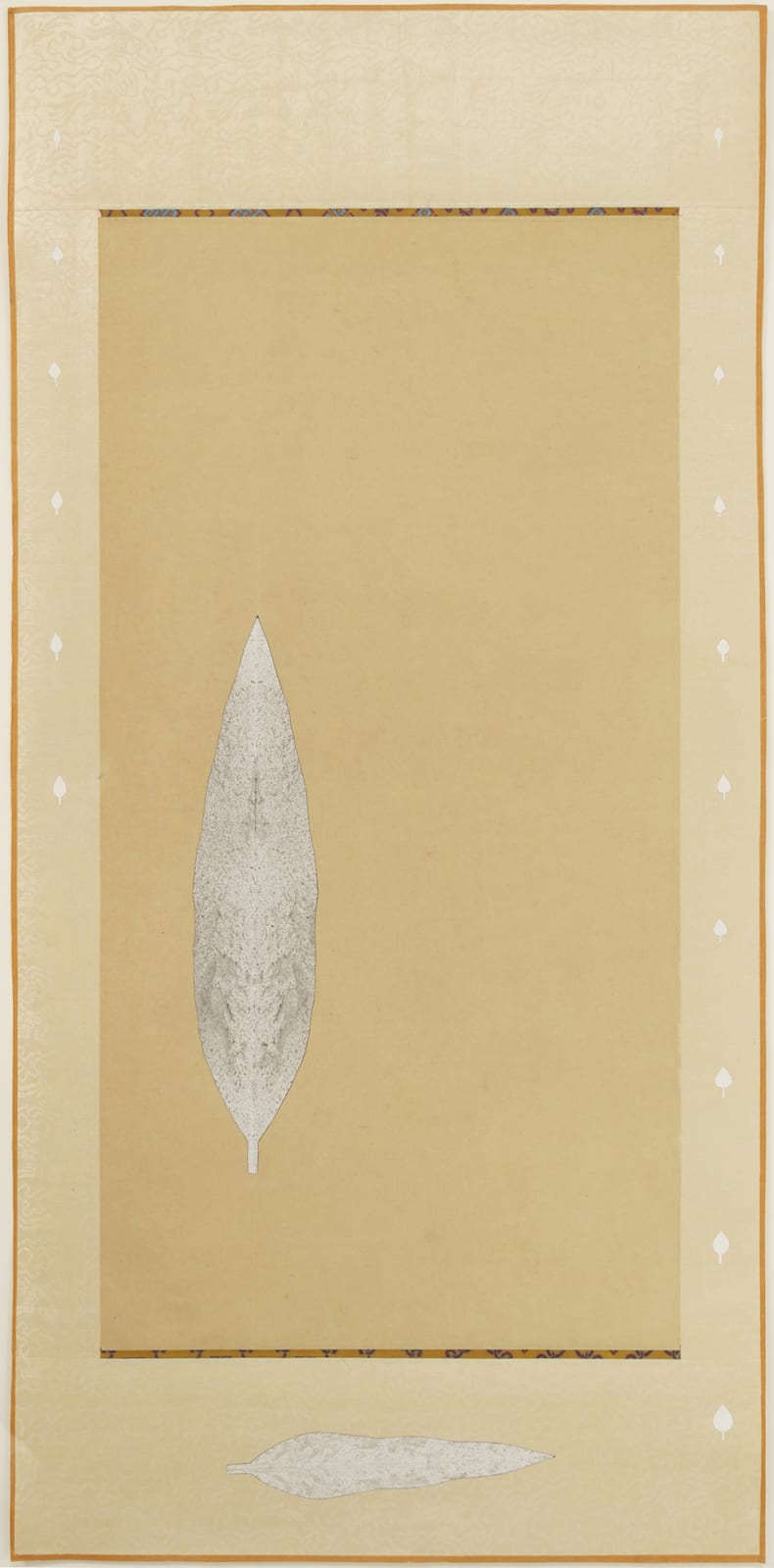 Leaves with fine ink blotting. One large vertical leaf on beige scroll with a horizontal leaf below the scroll. Several smaller vertical leaves line the scroll.