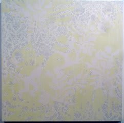 Several silkscreen layers of white gray and light green acrylic paint overlap on panel to display several intricate vegetal patterns