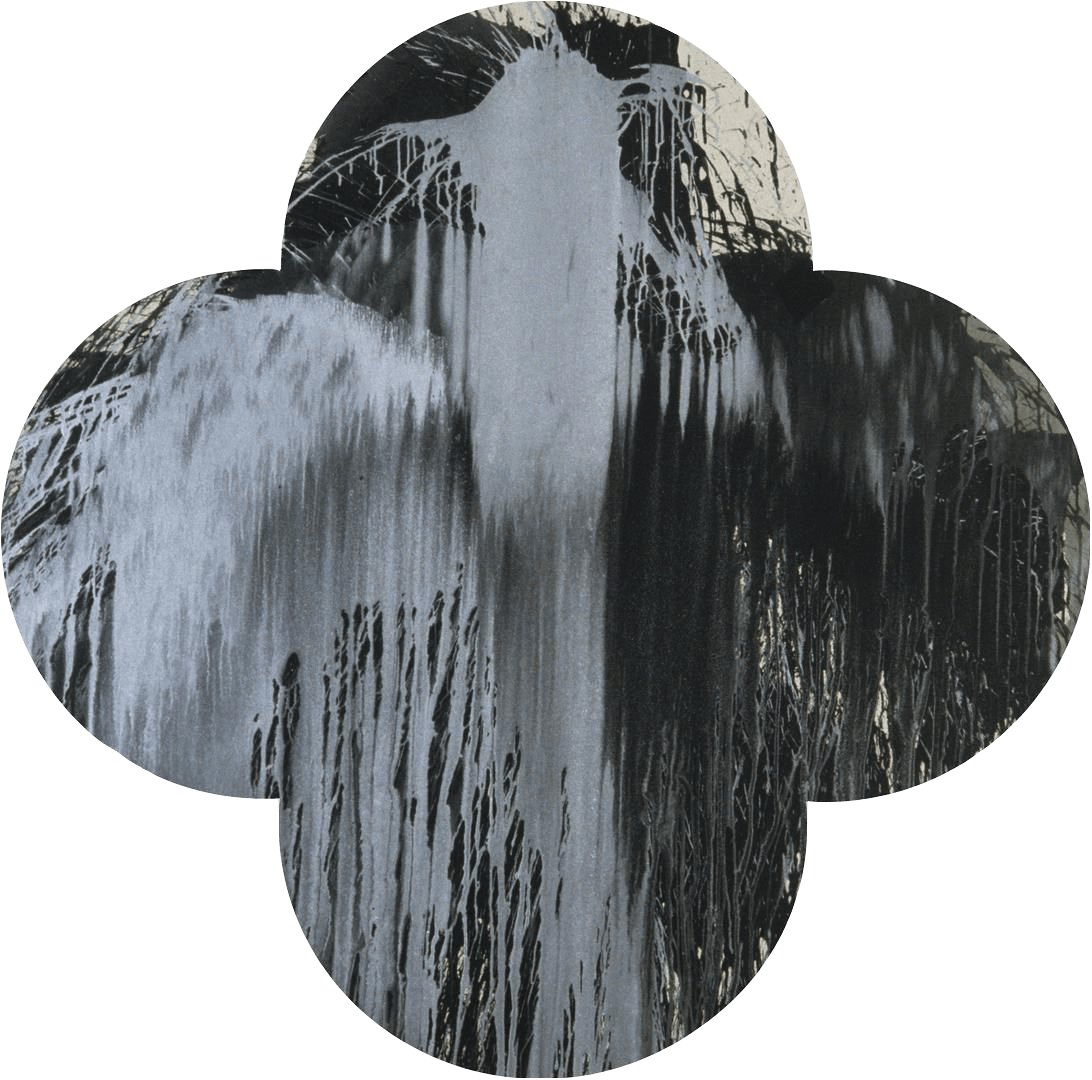 Black and gray dripping paint splotches on beige quatrefoil cut canvas