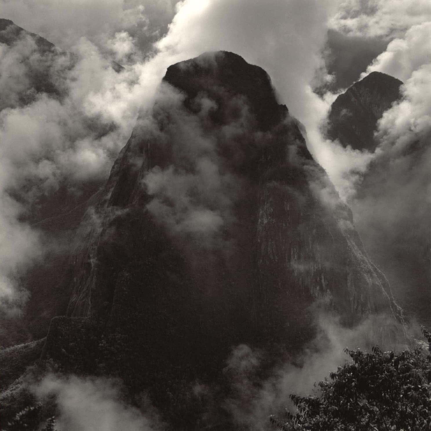 Machu Picchu, Peru in fog by Lynn Davis