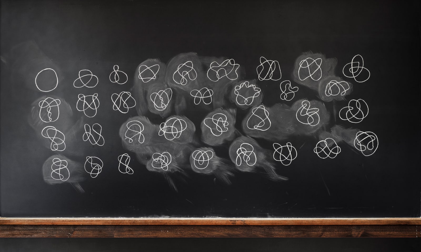 Chalkboard depicting knot theory formula from Do Not Erase series by Jessica Wynne