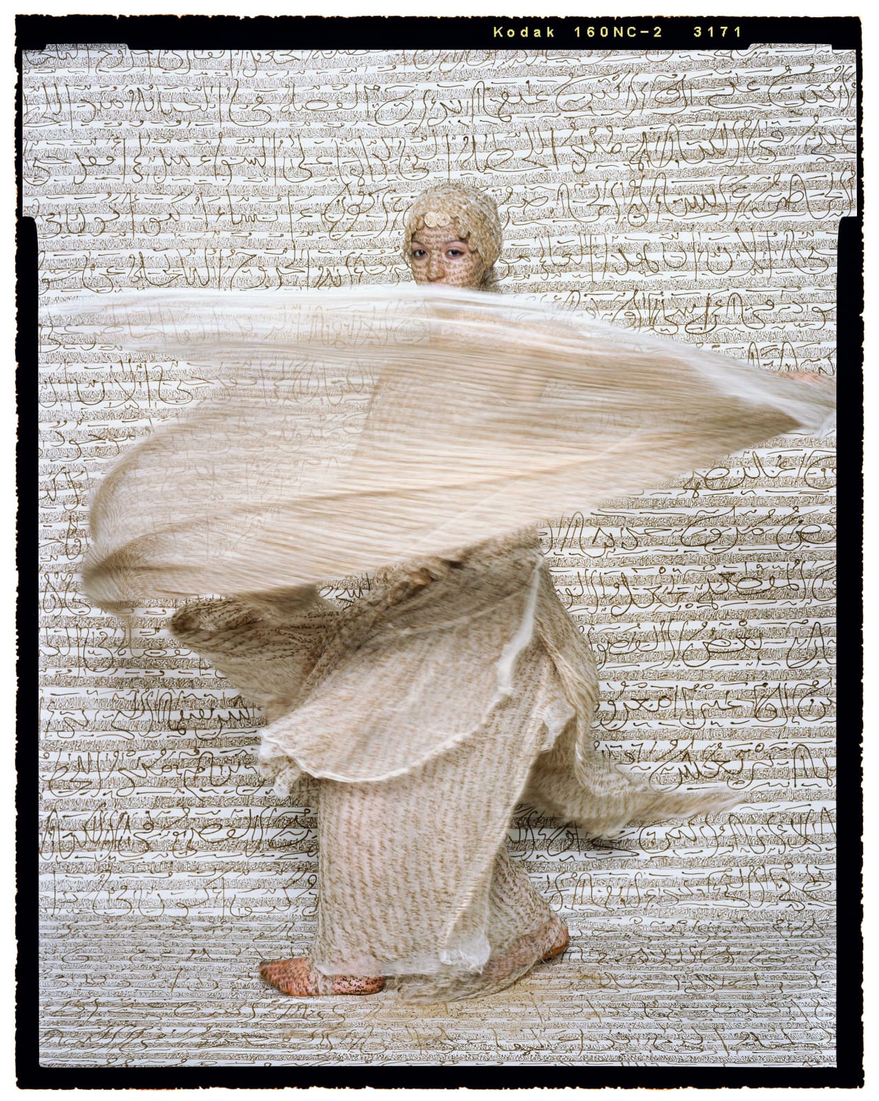 Lalla Essaydi, Dancer #10, Woman dancing with swirling fabric