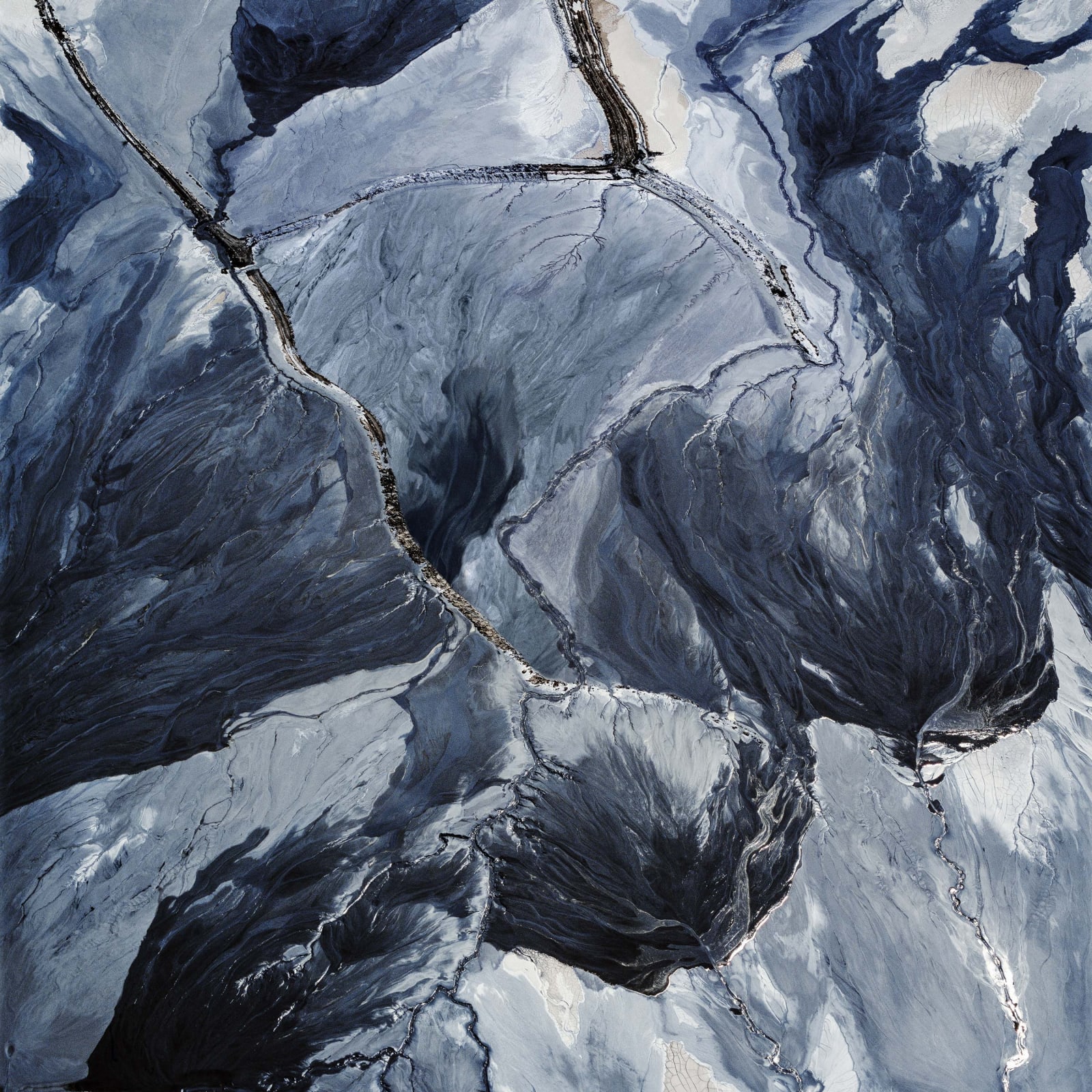 David Maisel Tailings Pond 3, Minera Centinela Copper Mine, Antofagasta Region, Atacama, Chile, 2018 aerial photograph of white and blue earth looks like abstract painting