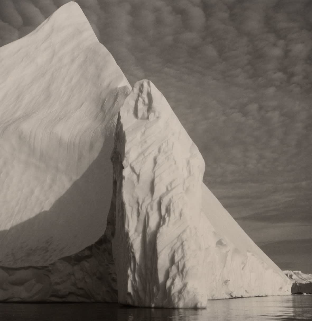 Lynn Davis photograph of geometric icebergs with pyramid and obelisk shape in Disko Bay, Greenland