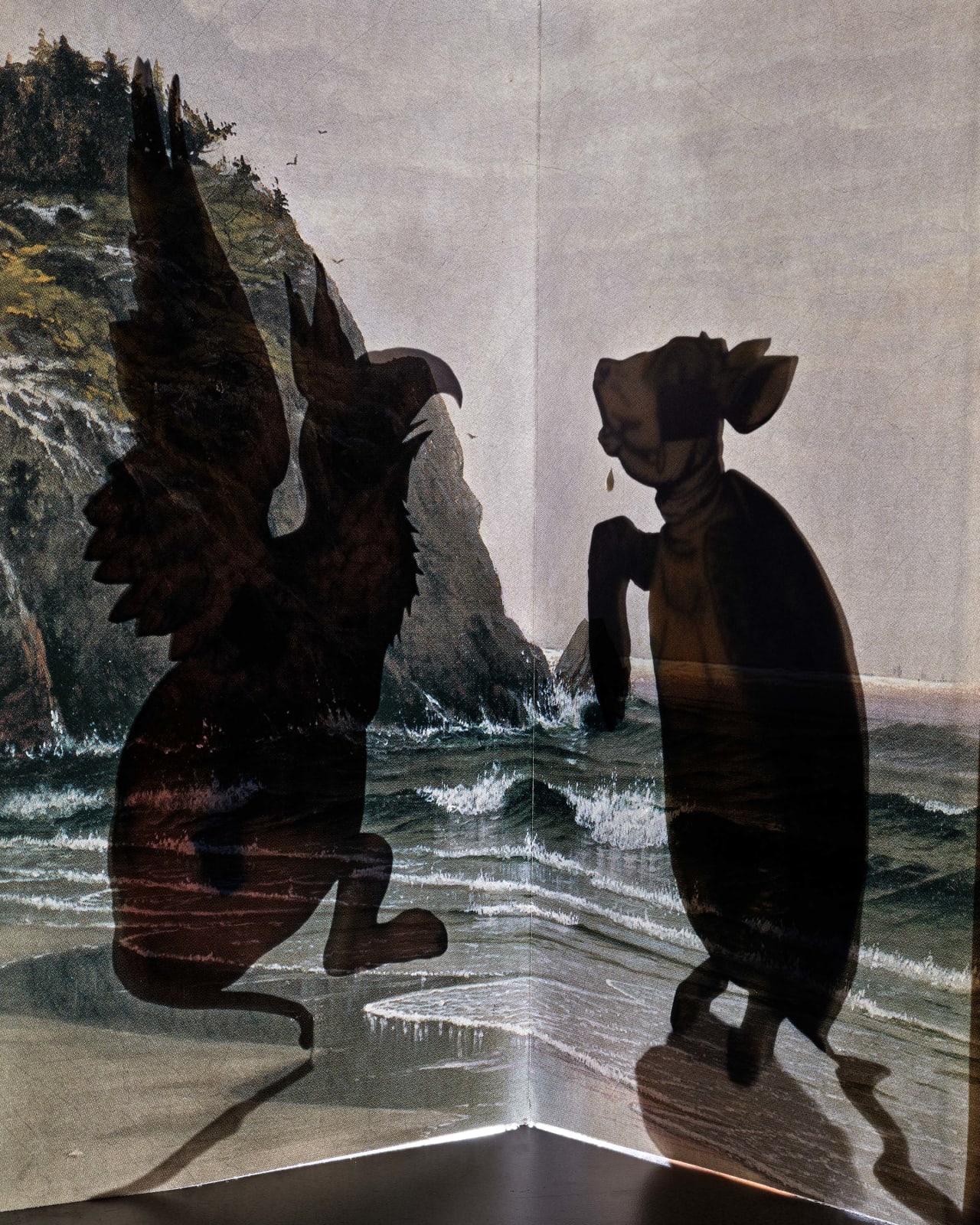 Abelardo Morell Alice in Wonderland Mock Turtle and chimera silhouettes with ocean background