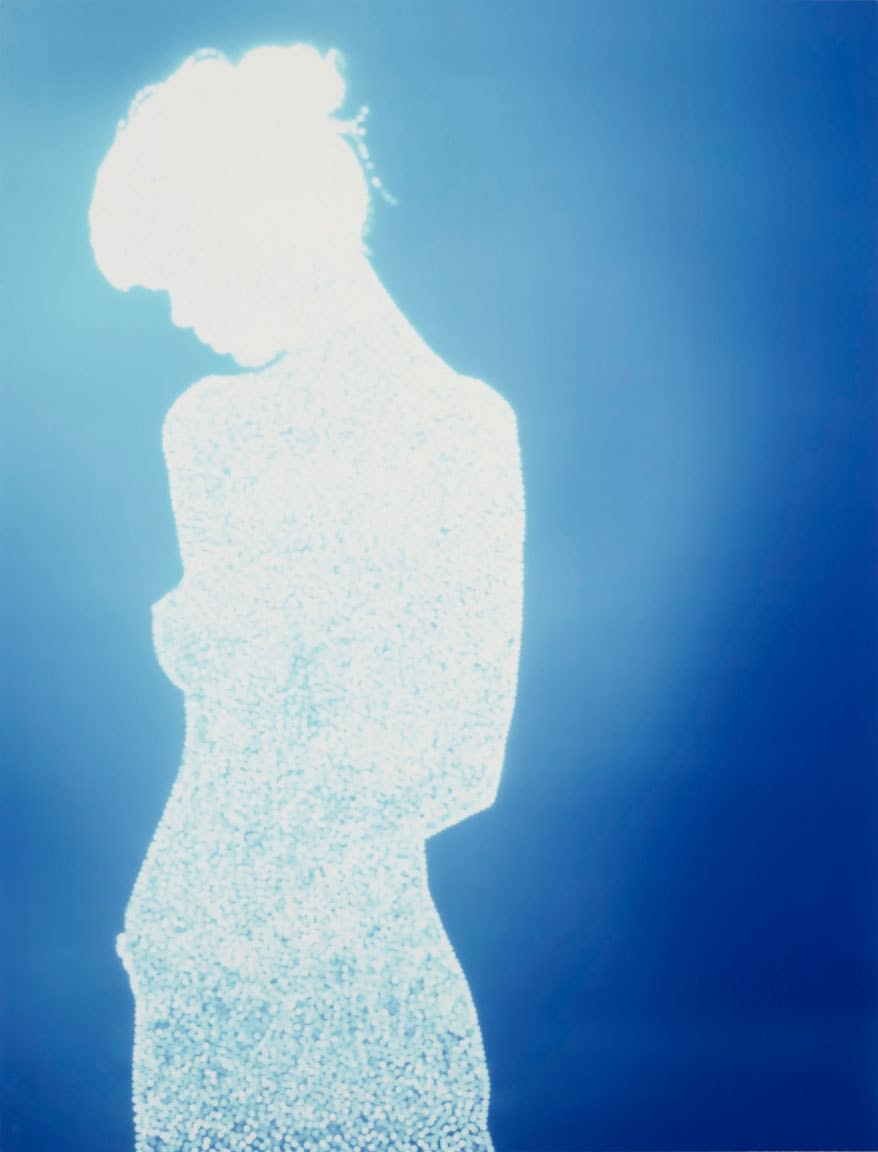 Claudia Schiffer's silhouette comprised of sun-filled pinholes, from the Tetrarch Guest series by Christopher Bucklow