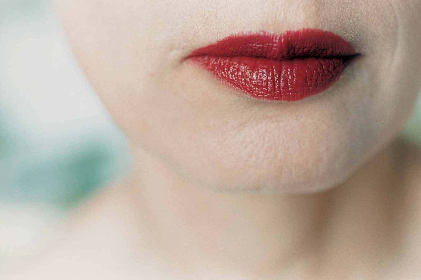 Her mother's lips in red lipstick, by Elinor Carucci