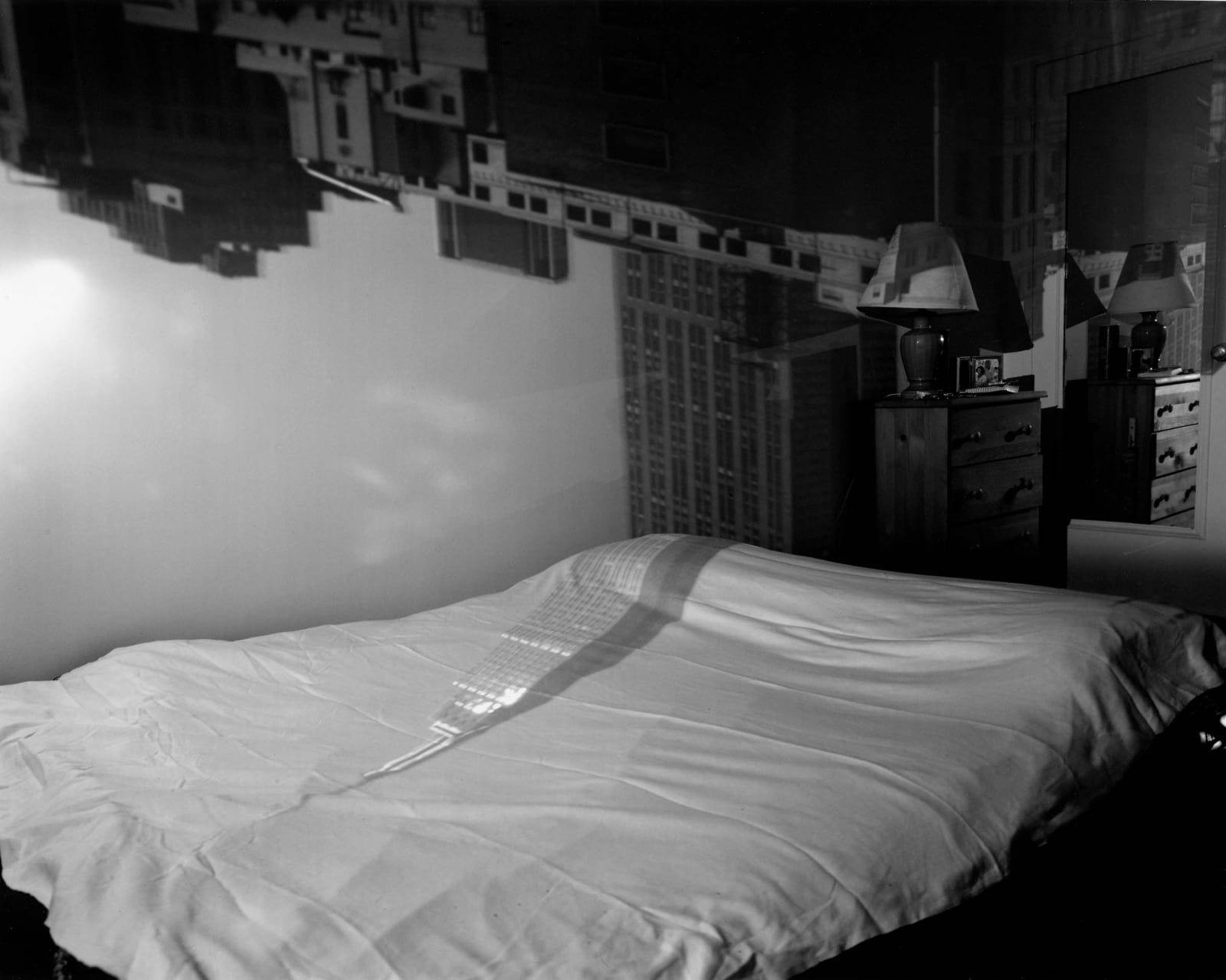 Abelardo Morell Camera Obscura of the Empire State Building in bedroom on bed black and white