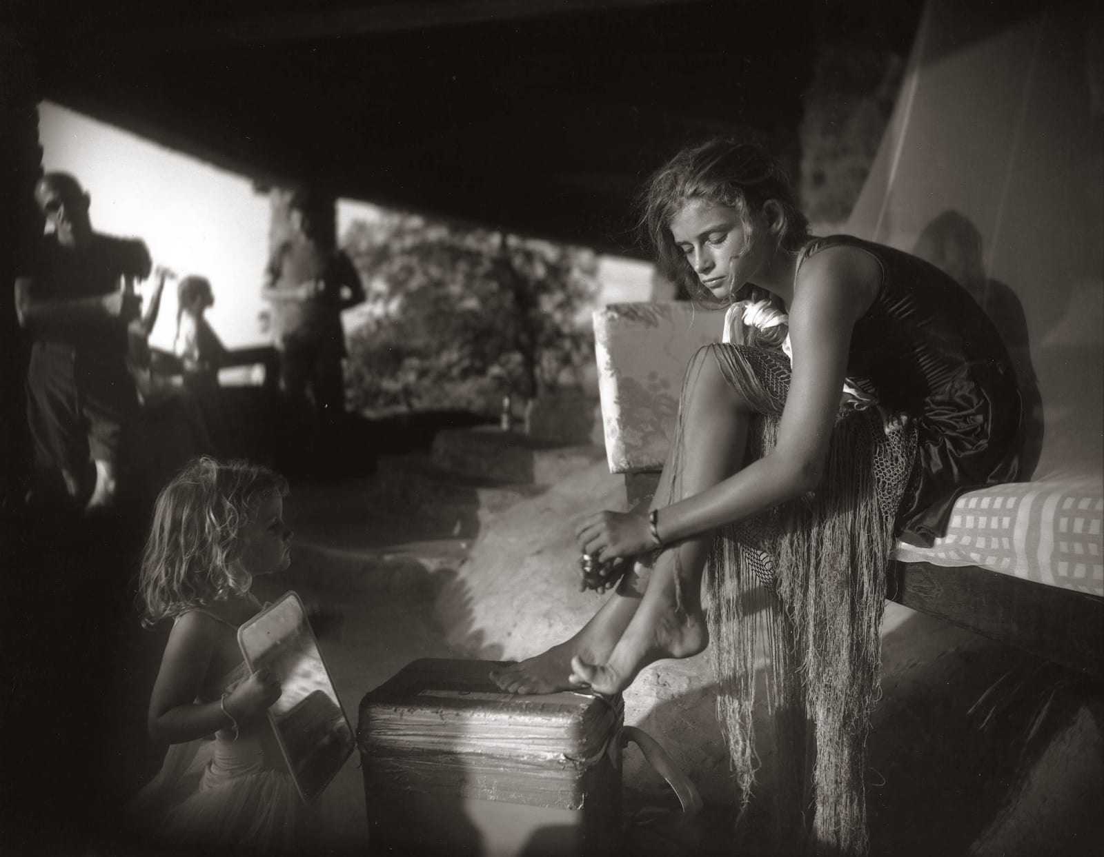 The Virtuous Girl, Jessie sitting down while Virginia holds mirror for her, from the Immediate Family series by Sally Mann