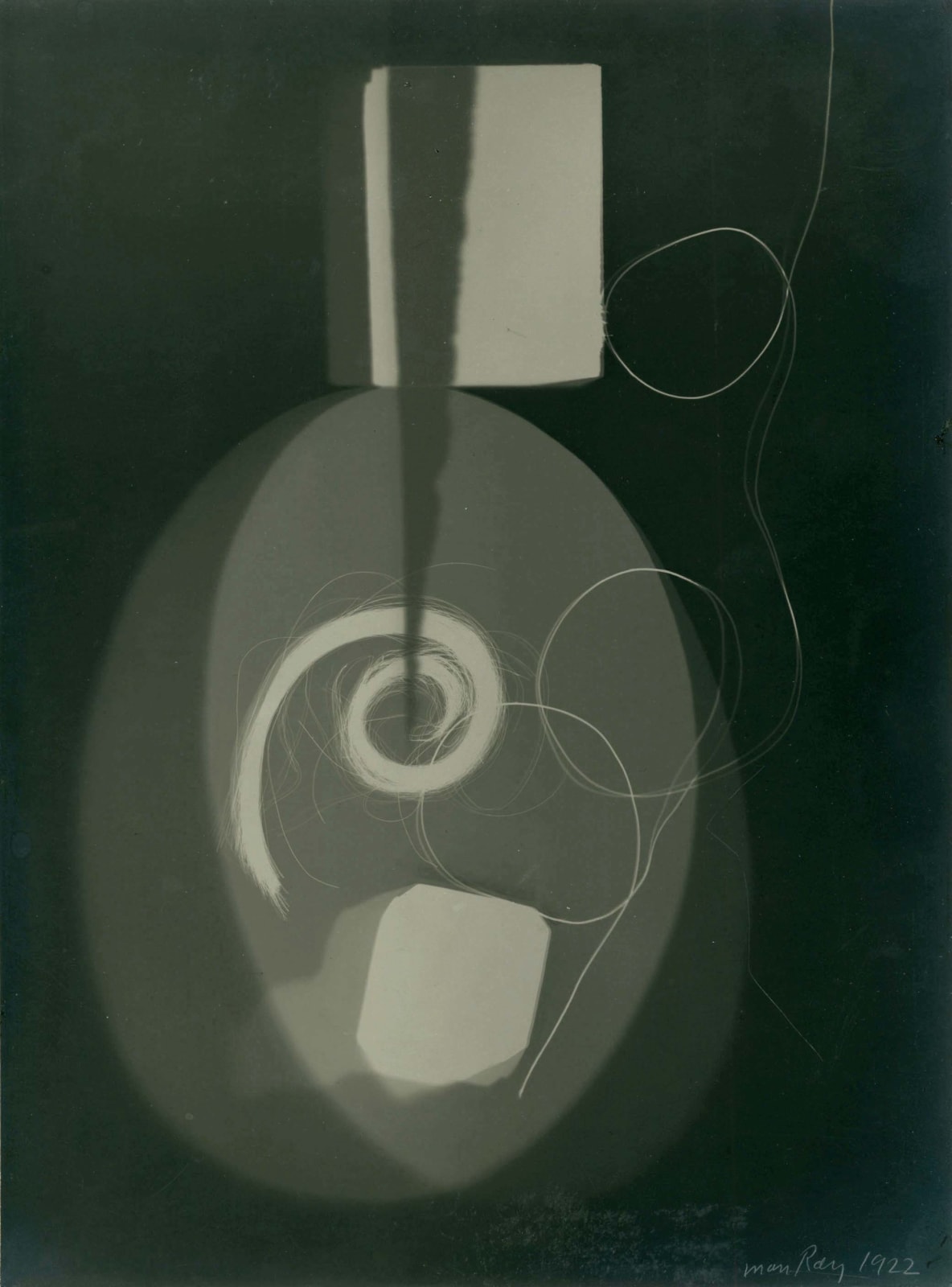 Man Ray, Rayograph with lock of hair, 1922