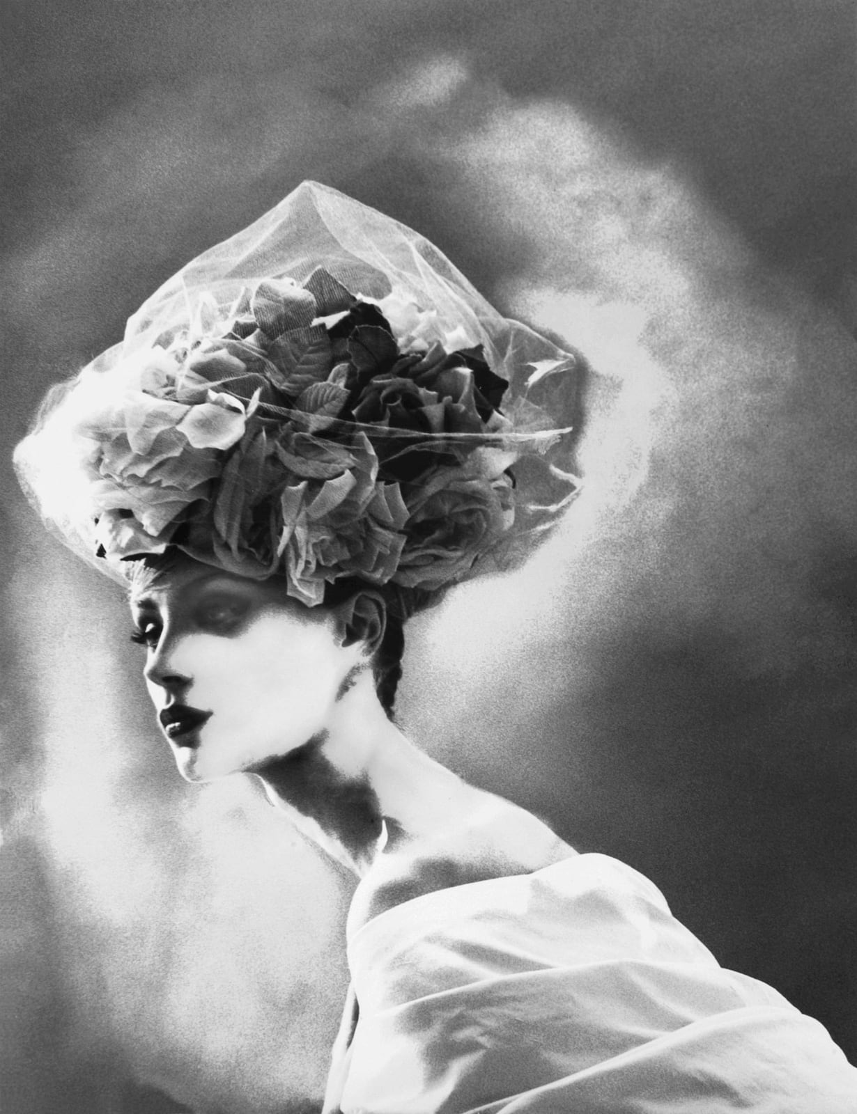 Lillian Bassman, Night Bloom, Olga Pantushenkova, hat by Christian Lacroix Haute Couture, Paris, The New York Times Magazine, 31 March...