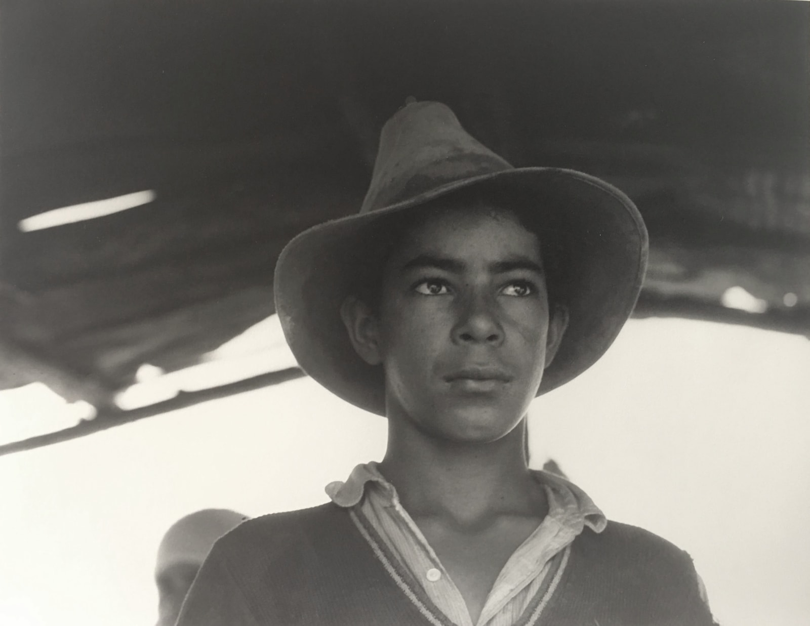 Dorothea Lange Migrant Worker young man in hat 