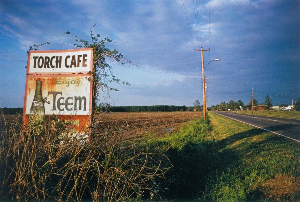 William Eggleston, Untitled (Torch Cafe billboard), Mississippi [From Dust Bells 2], 1973
