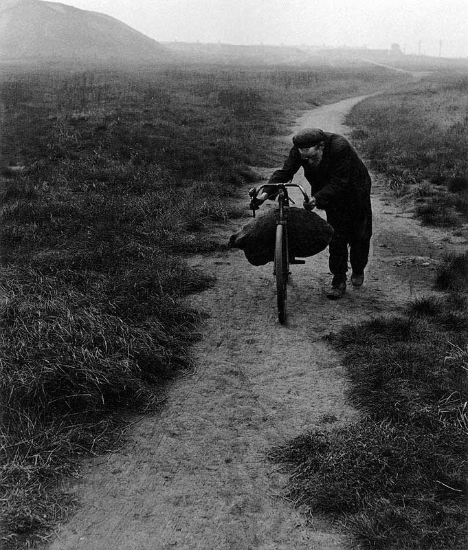 Bill Brandt, Coal-Searcher Going Home to Jarrow, 1937
