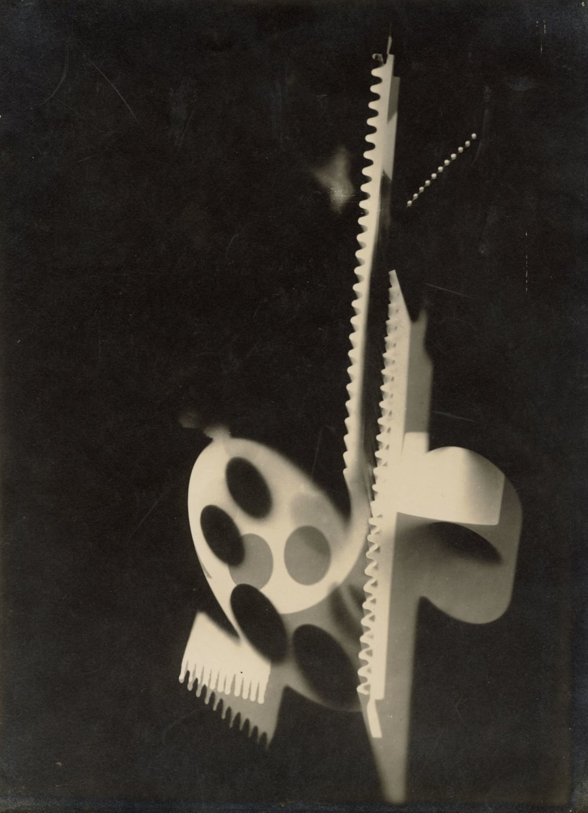 Man Ray, Rayograph (grater, film reel), 1929-1930