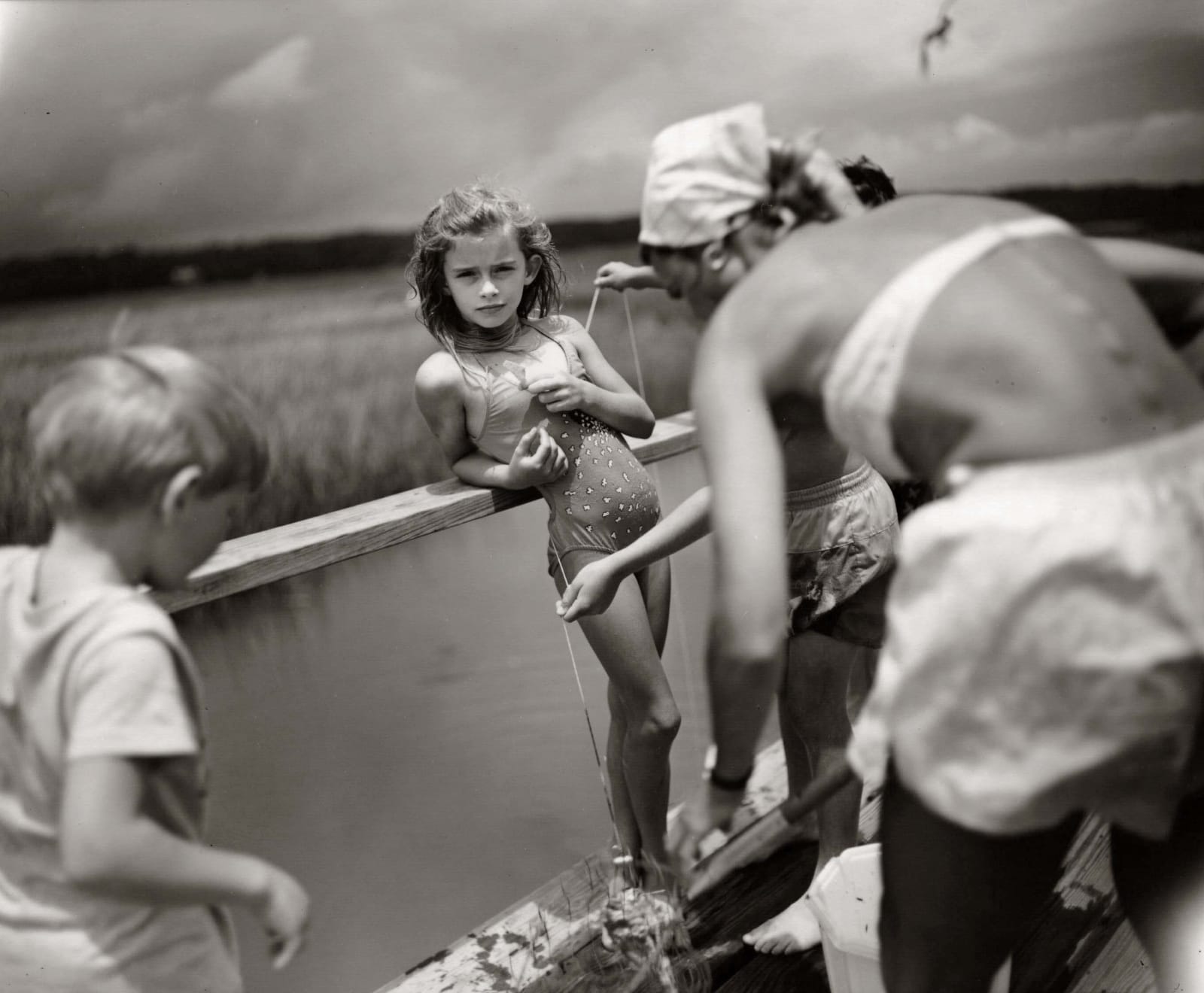 Virginia in bathing suit, crabbing at Pawley's, from the Immediate Family series by Sally Mann