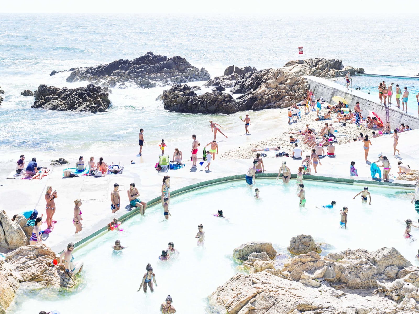 Bathers at tide pool in  Leça Palmeira, Portgual by Massimo Vitali