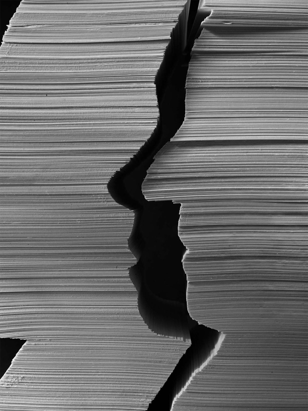 Abelardo Morell Paper Marriage stacks of paper in shape of silhouettes of man and woman artist and his wife Lisa