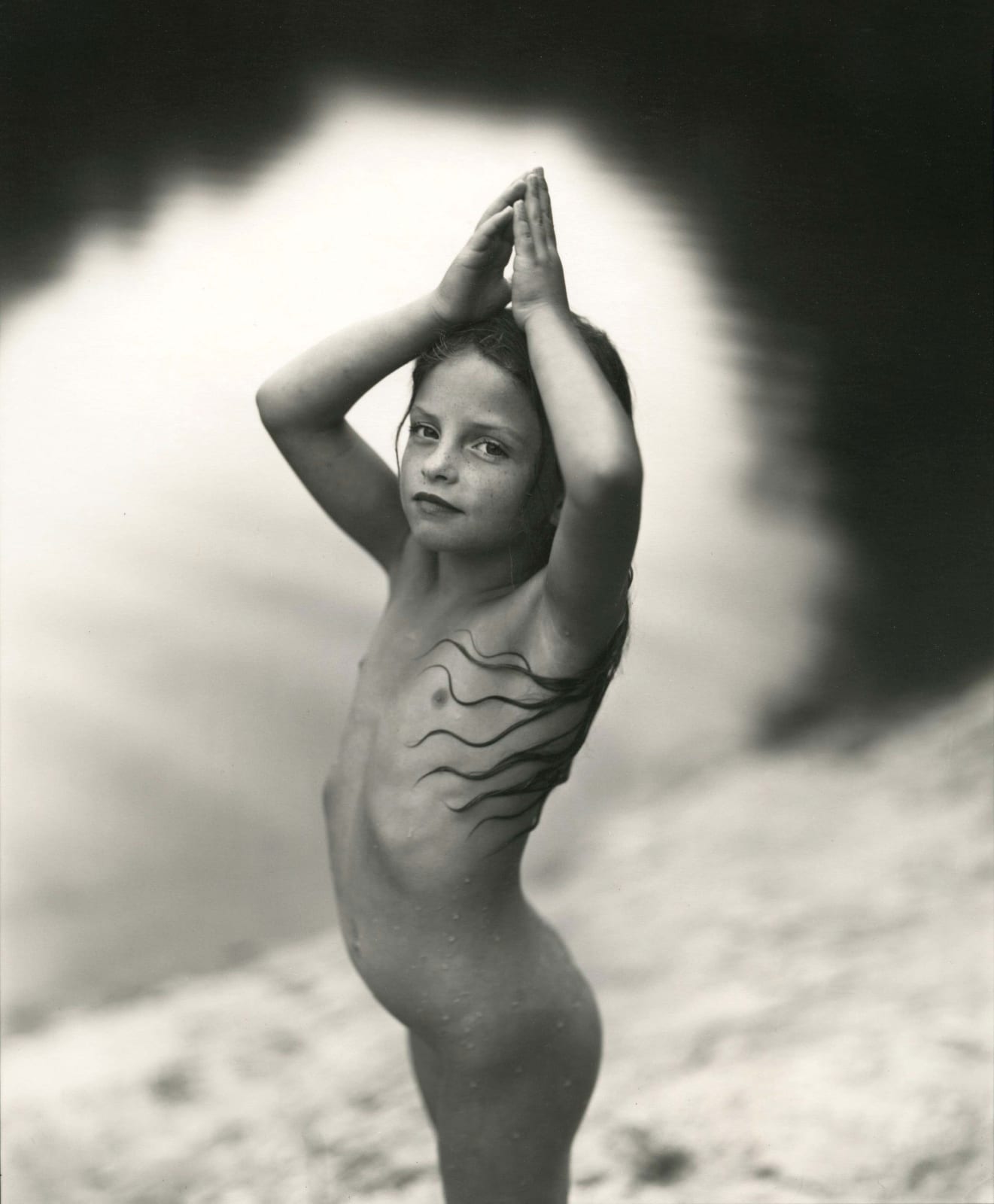 Virginia about to dive into the river by Sally Mann