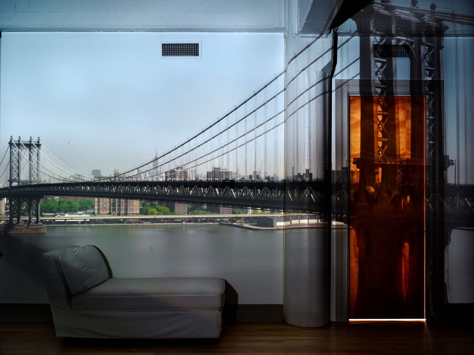 Abelardo Morell Camera Obscura View of the Manhattan Bridge April Morning in room with low gray couch