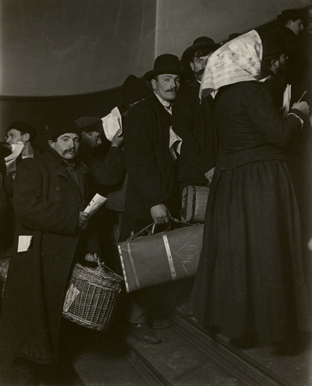 Lewis Hine, Climbing into America, Ellis Island, 1905