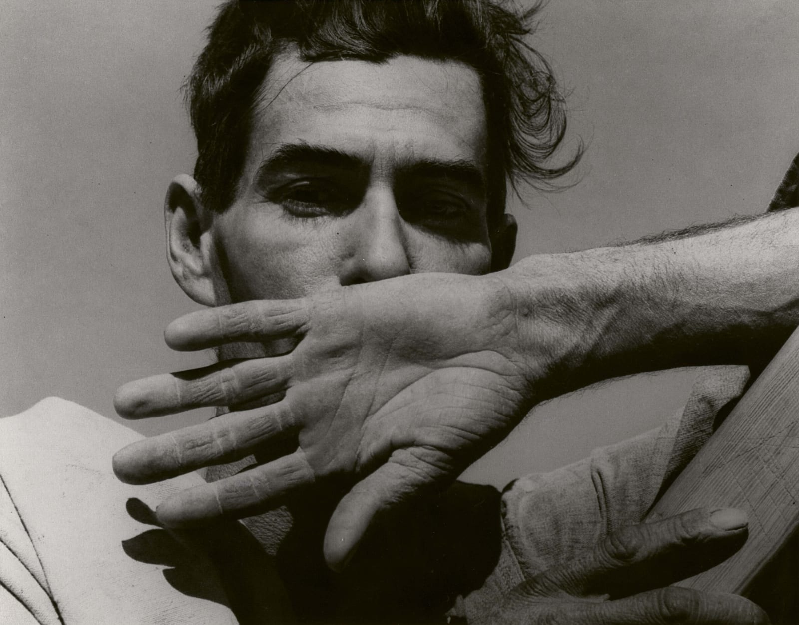 Dorothea Lange Migratory Cotton Picker Eloy Arizona man with hand covering his mouth